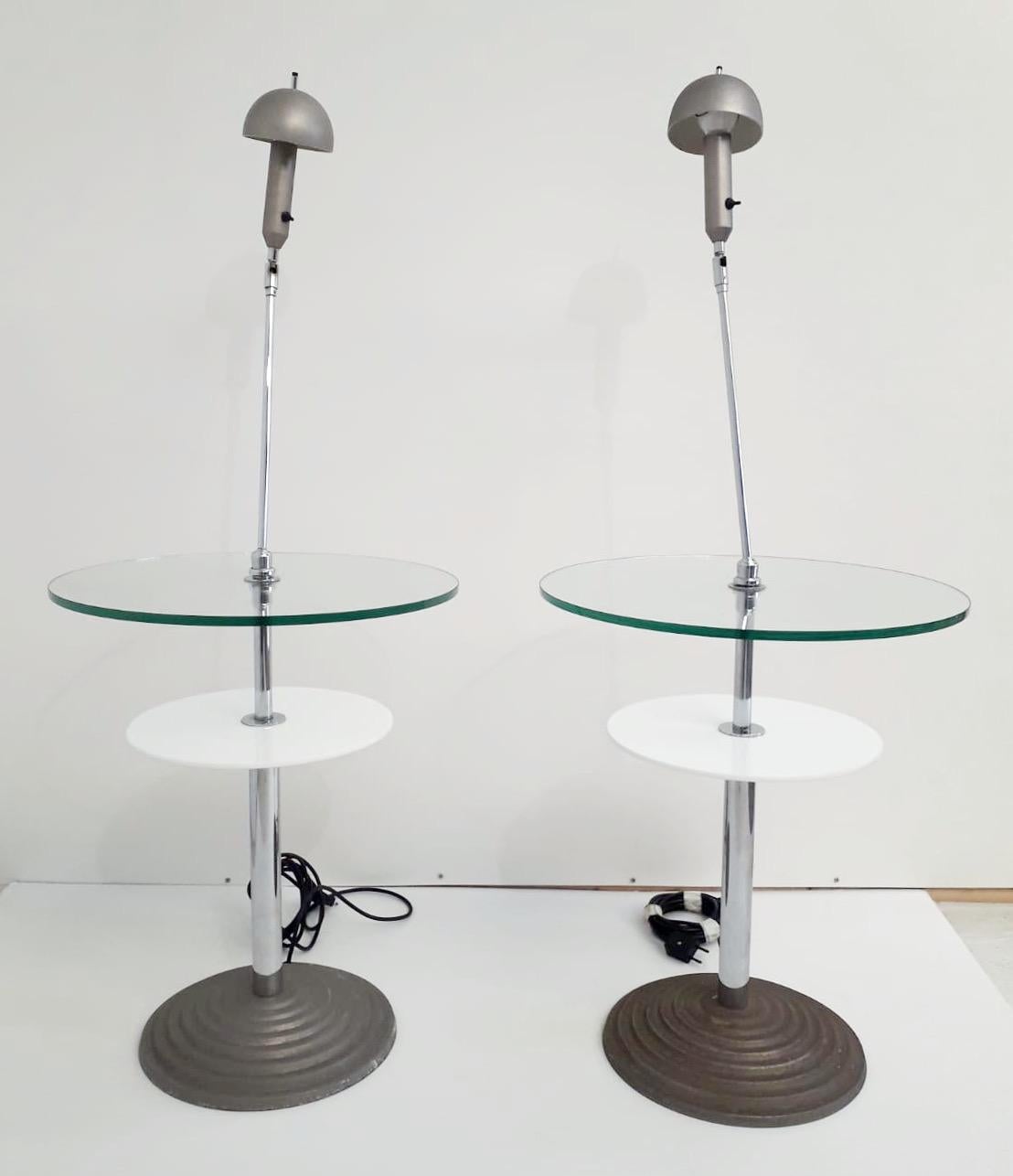 Original pair of Model 2755 vintage lamp tables with adjustable stems, clear and opaline glass tops, designed by Daniela Puppa and Franco Raggi for Fontana Arte, made in Italy in 1988
Original sticker on the table base.
1 light each table / E26 or