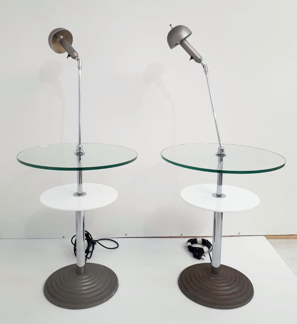 Original pair of Model 2755 vintage lamp tables with adjustable stems, clear and opaline glass tops, designed by Daniela Puppa and Franco Raggi for Fontana Arte, made in Italy in 1988
Original sticker on the table base.
1 light each table / E26 or