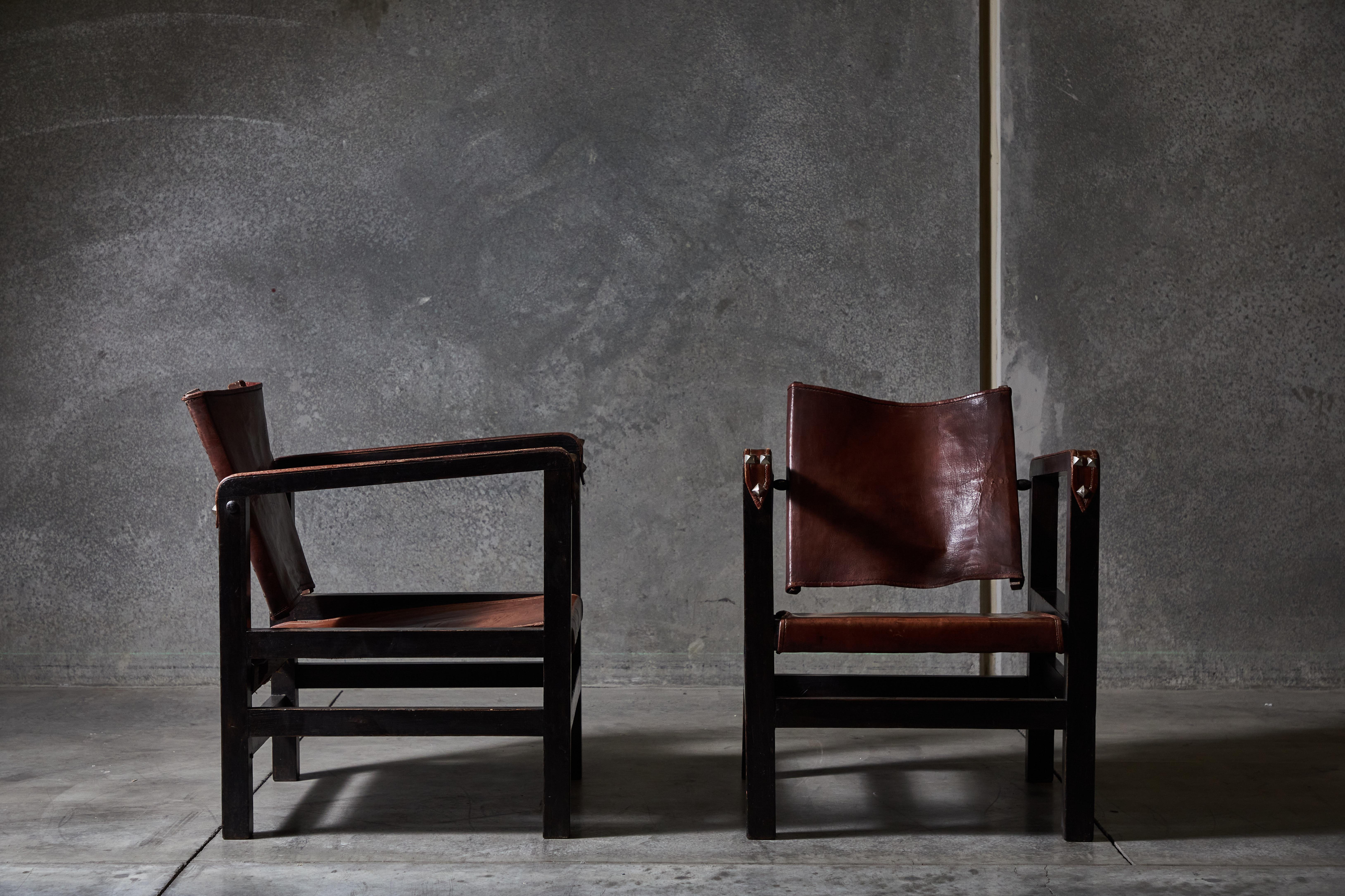Rare pair of leather armchairs by Adolphe Chanaux for Chanaux & Co. Made in France, circa 1930s.

Chanaux & Co. impressed to wood frame.