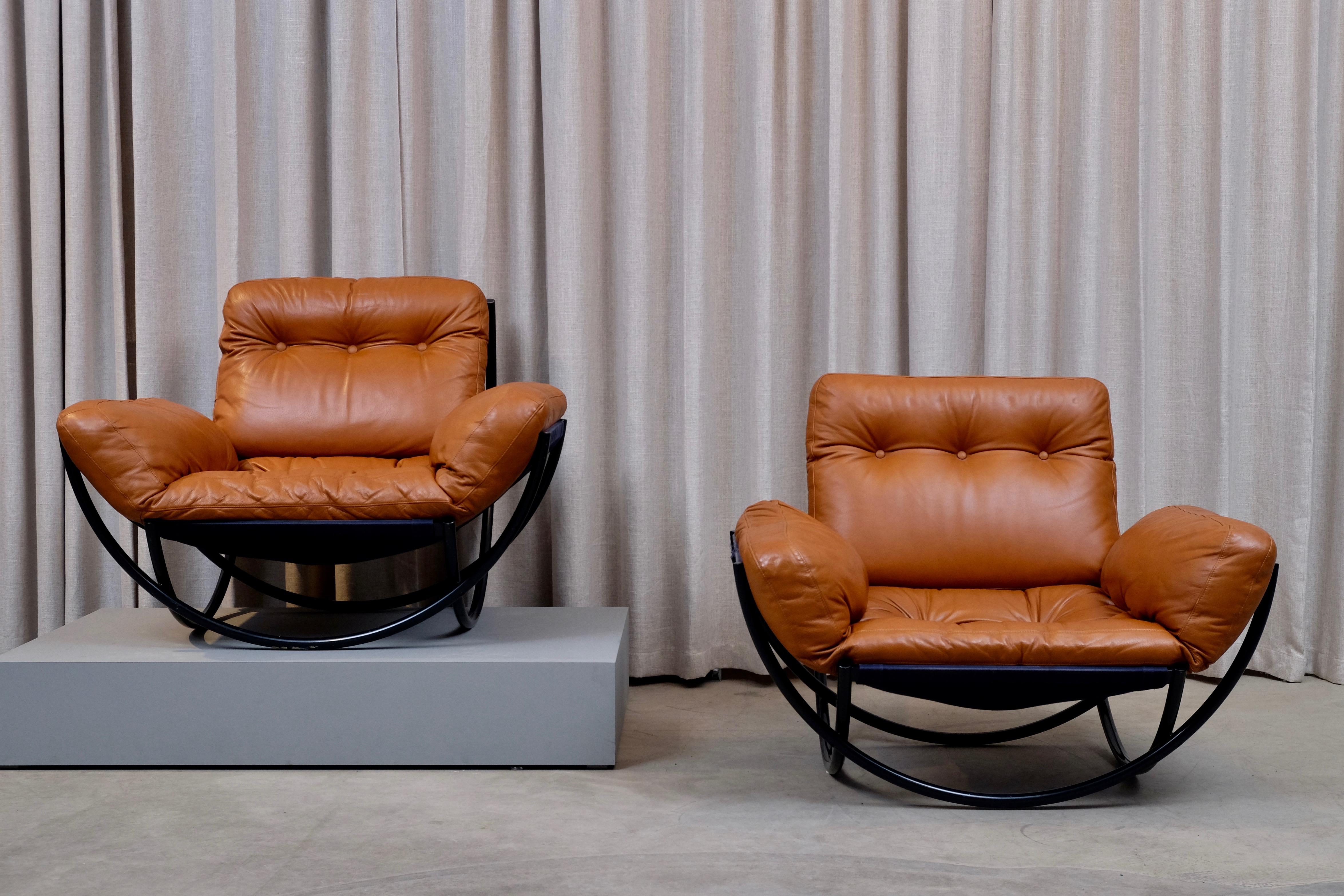 A rare pair of armchairs / lounge chairs by Lennart Bender for AB Wilo, Sweden. Excellent condition.
This example has a black frame which where produced in very few examples, total of quantity of 10 chairs.