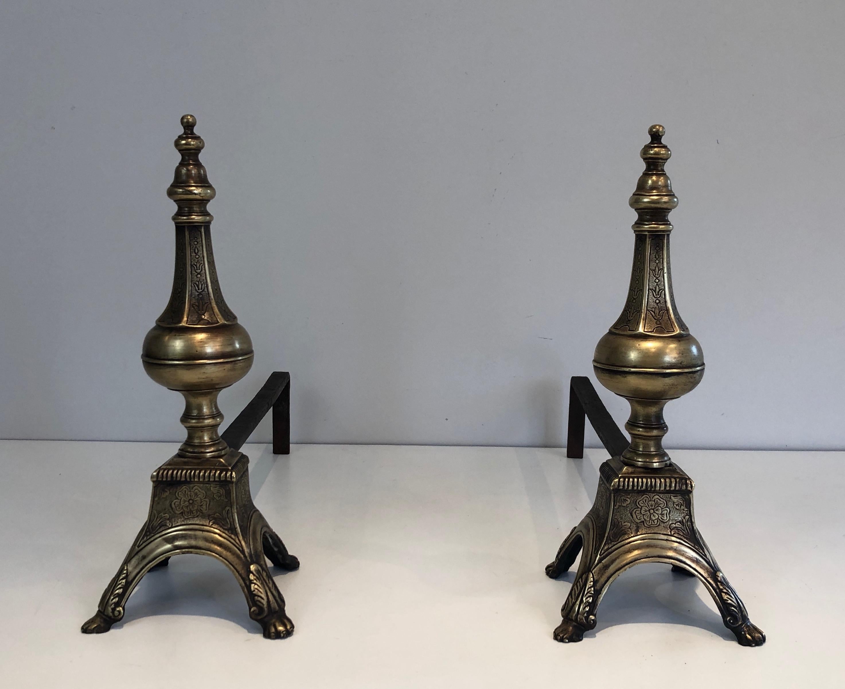 This rare pair of Louis the 16th style andirons are made of chiseled bronze and wrought iron. This is a nice and Fine French work, from 19th century.