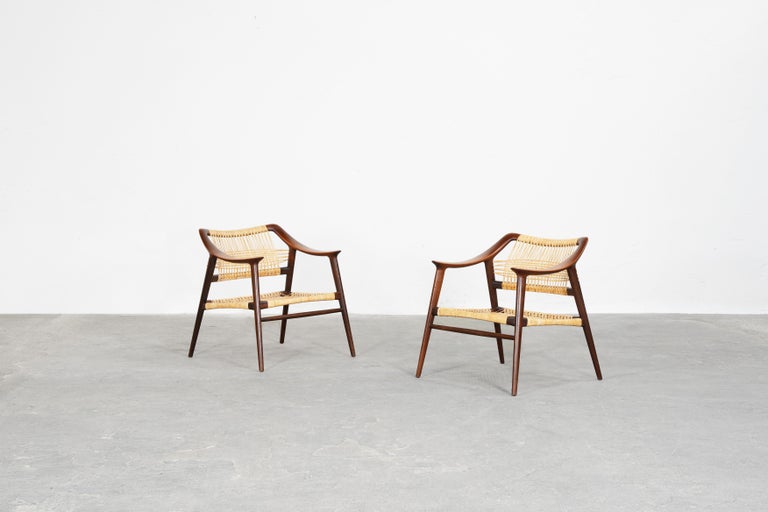 Beautiful rare pair of lounge chairs model 56/2 ‘Bambi’ designed by Rolf Rastad & Adolf Relling. and produced by Gustav Bahus, Norway in 1954.
Both chairs are made out of teak and cane and are in excellent condition.