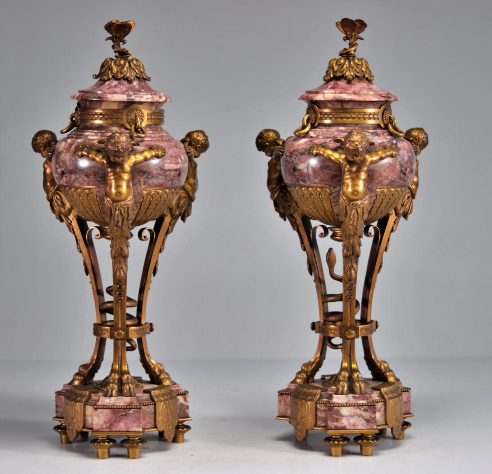 Rare pair of marble and gilt bronze Cassolettes 19th century
decorated with angels
Weight: 24.20 kg
Sizes: H 55.0cm x D 23.0cm 
very good condition.