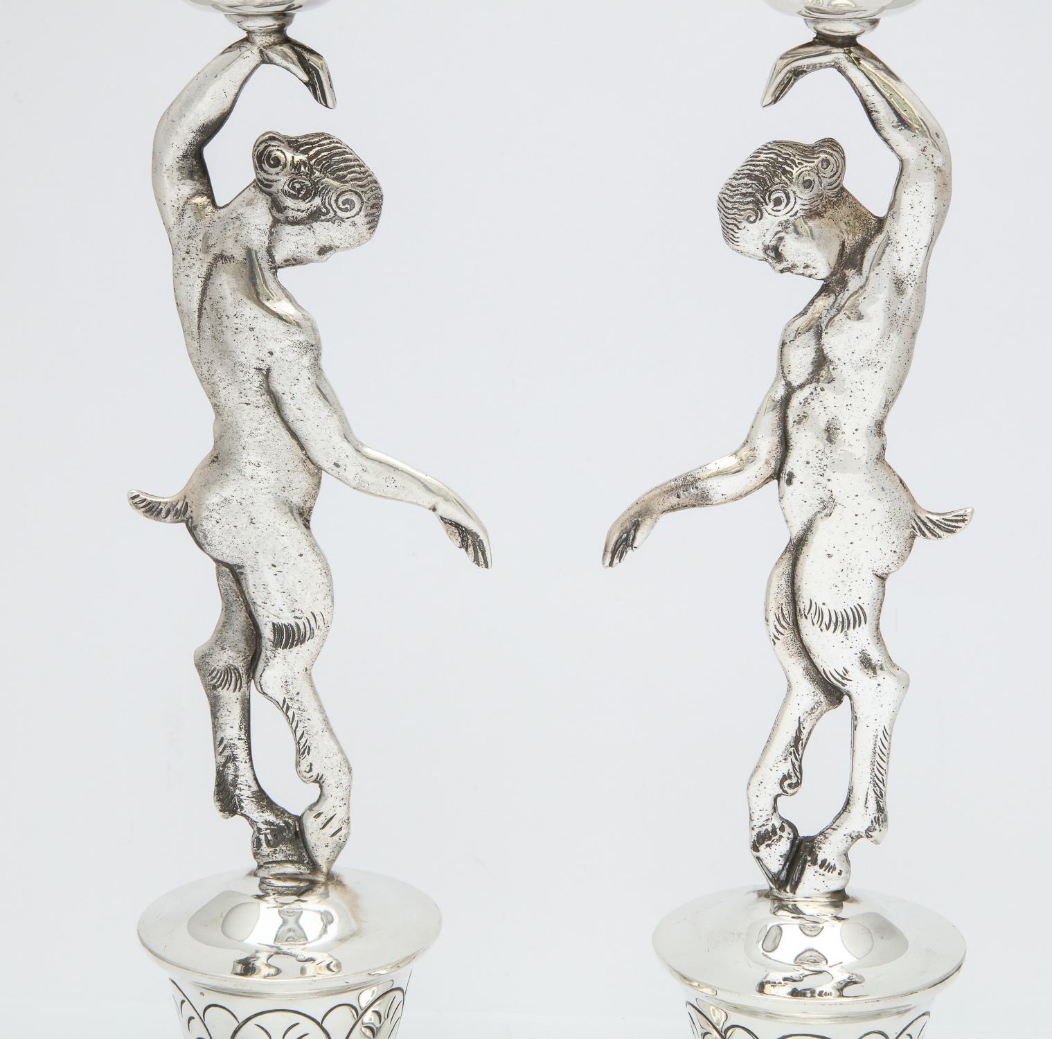 Rare Pair of Midcentury Sterling Silver Mexican Satyr-Form Candlesticks In Excellent Condition In New York, NY