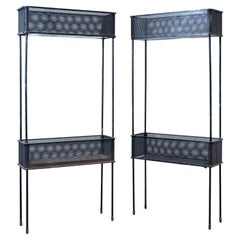 Rare pair of mid century two tier jardinieres by Mathieu Matégot