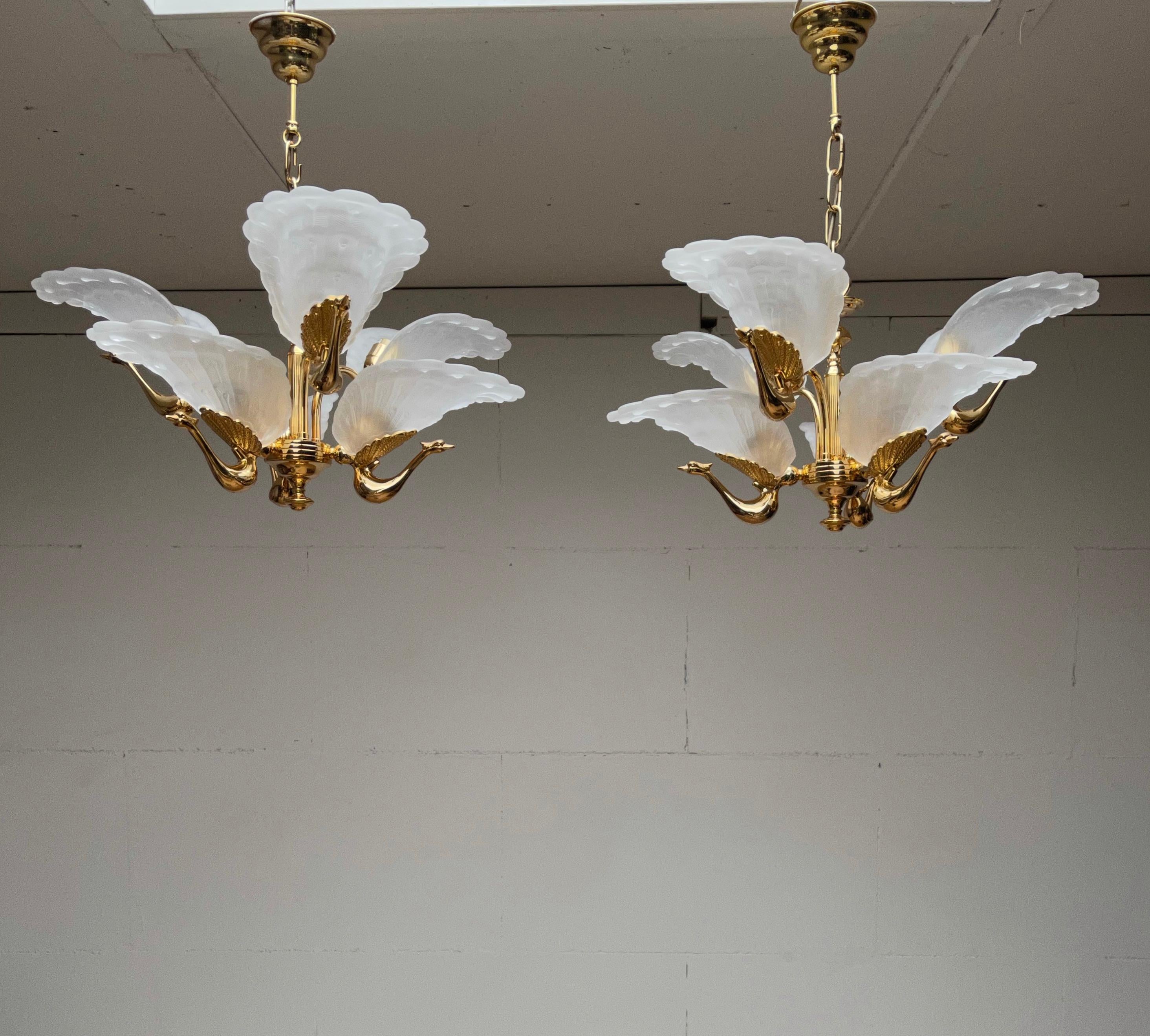 Sculptural and highly decorative two-tier light fixtures.

The peacock has, since ancient times, been regarded as an animal with many positive and even healing characteristics. And that has inspired many artist and designers through all times and