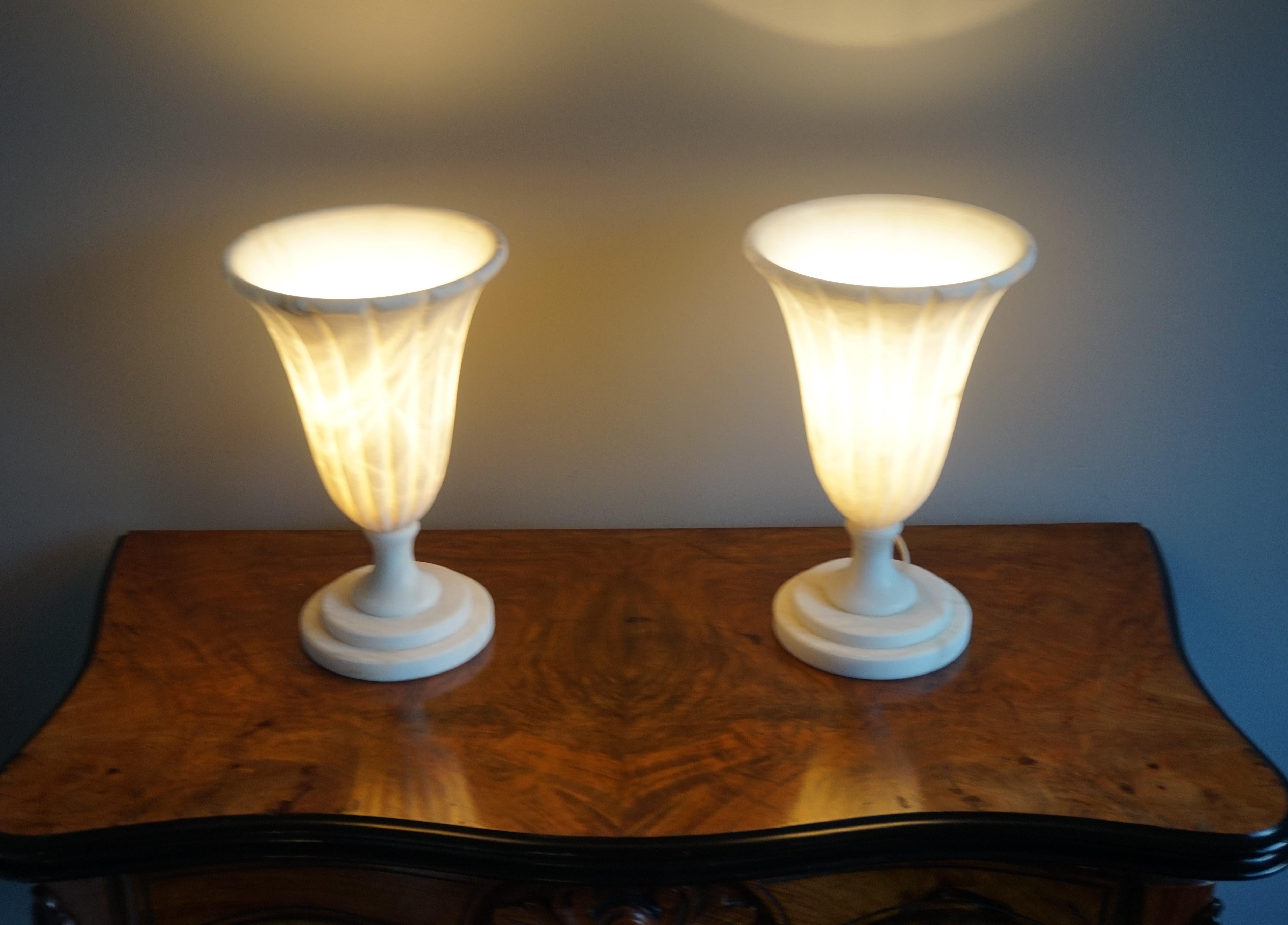 Rare pair of midcentury made alabaster table or desk lamps / classical style handcrafted and very stylish pair of midcentury made alabaster lamps.

If you are looking for a great shape and practical size pair of table lamps to grace your living