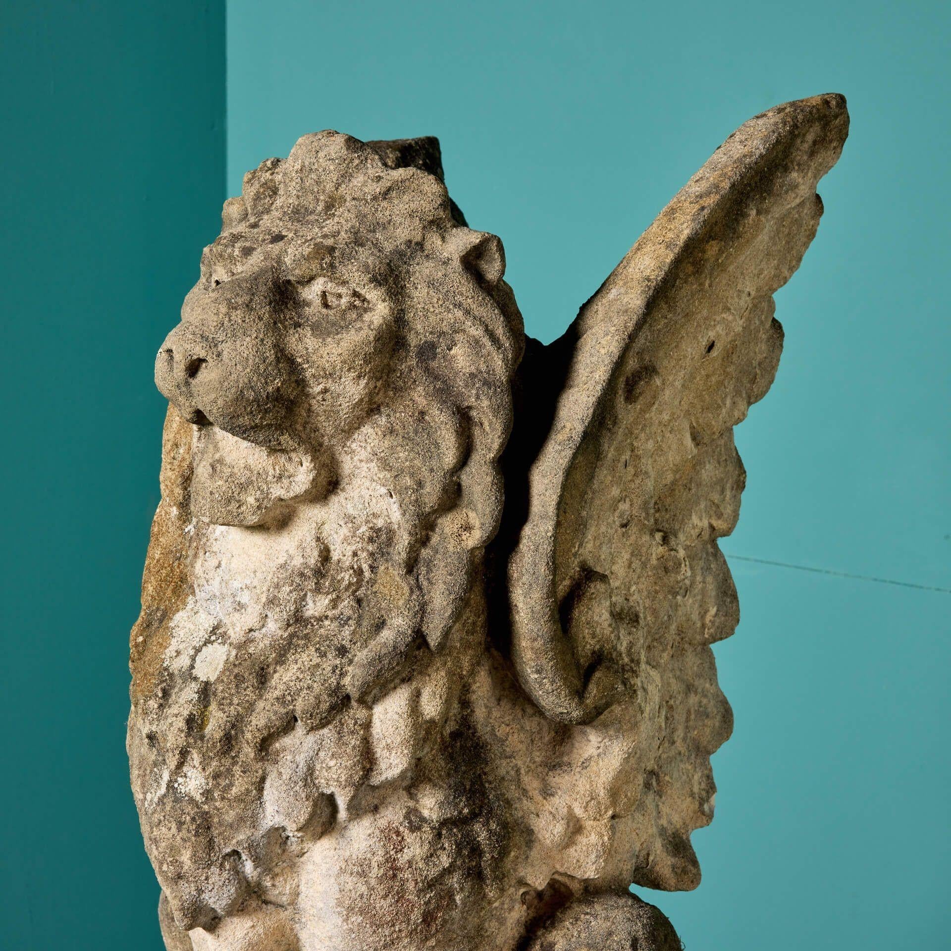English Rare Pair of Natural Limestone Winged Lion Statues For Sale
