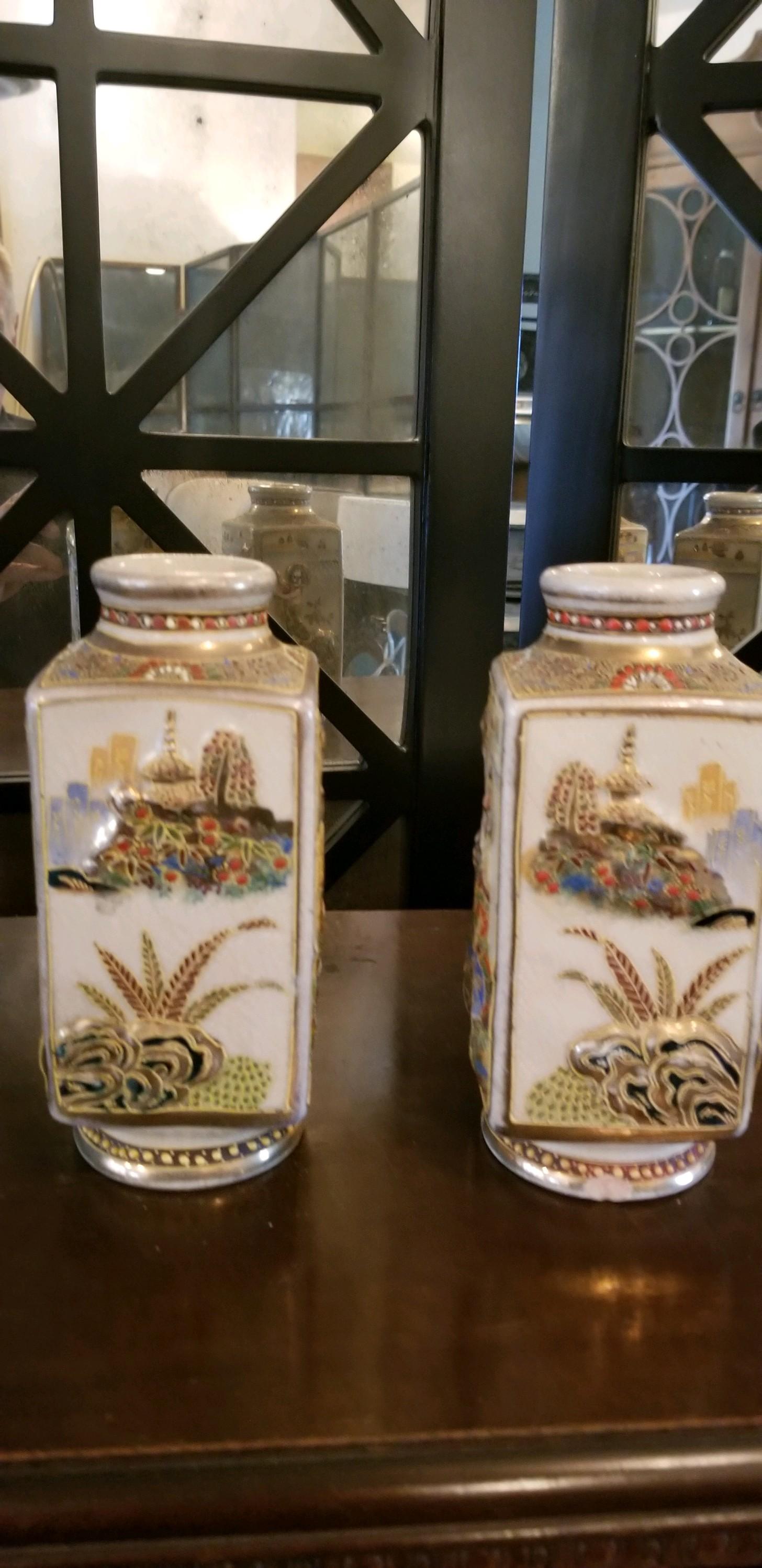 This a rare pair of opposing Chinese vases with gods motif. Late 19th century attribution. Good condition. These vases usually get separated, but these vases stayed intact. Use on your table scape. entry chest or mantel (fireplace). Perfectly at