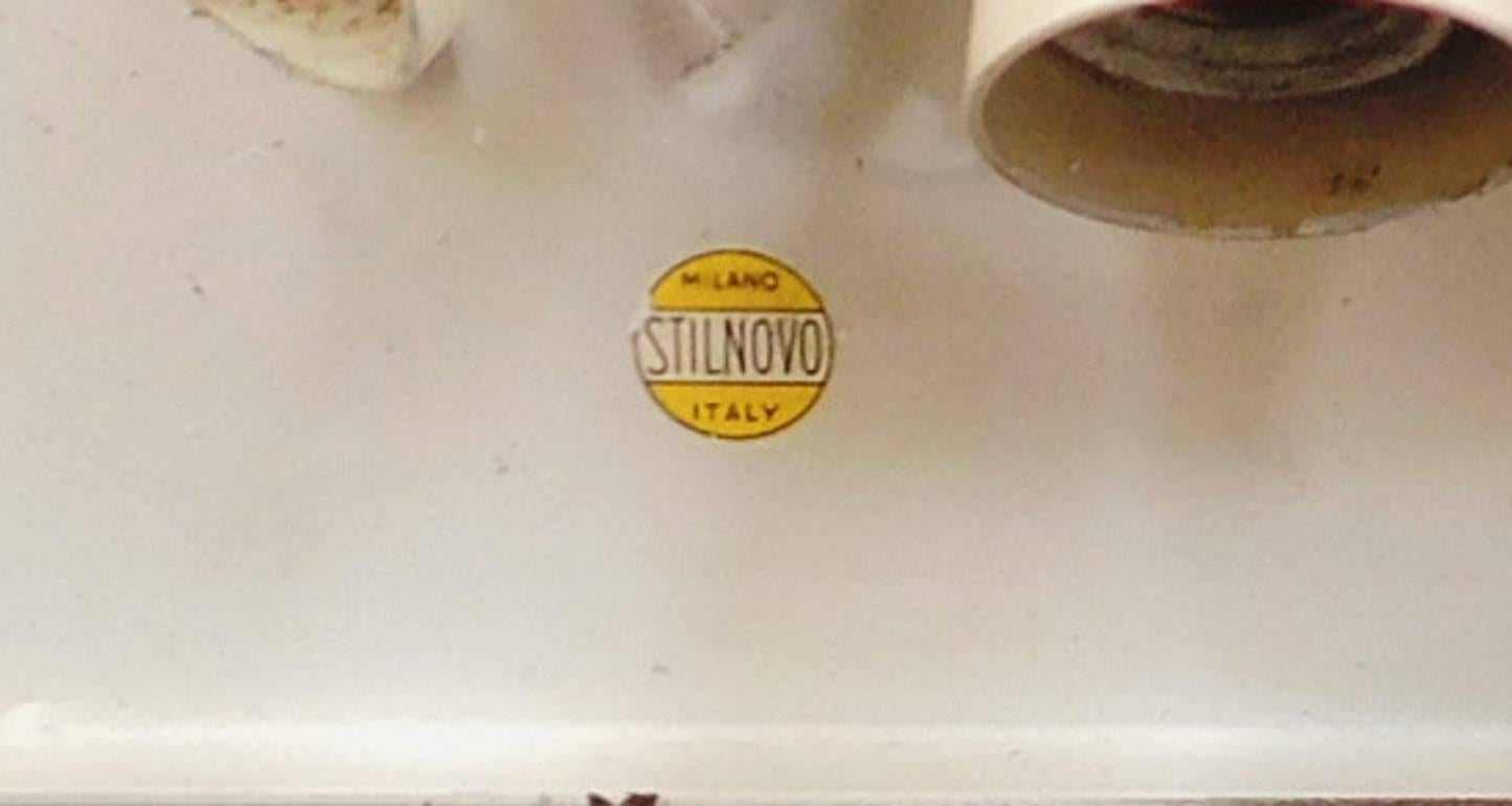 Rare pair of original vintage wall lights with beveled and textured glass on painted metal frame and satin nickel details, designed by Stilnovo, circa 1960’s / Yellow original stickers by Stilnovo / Made in Italy 