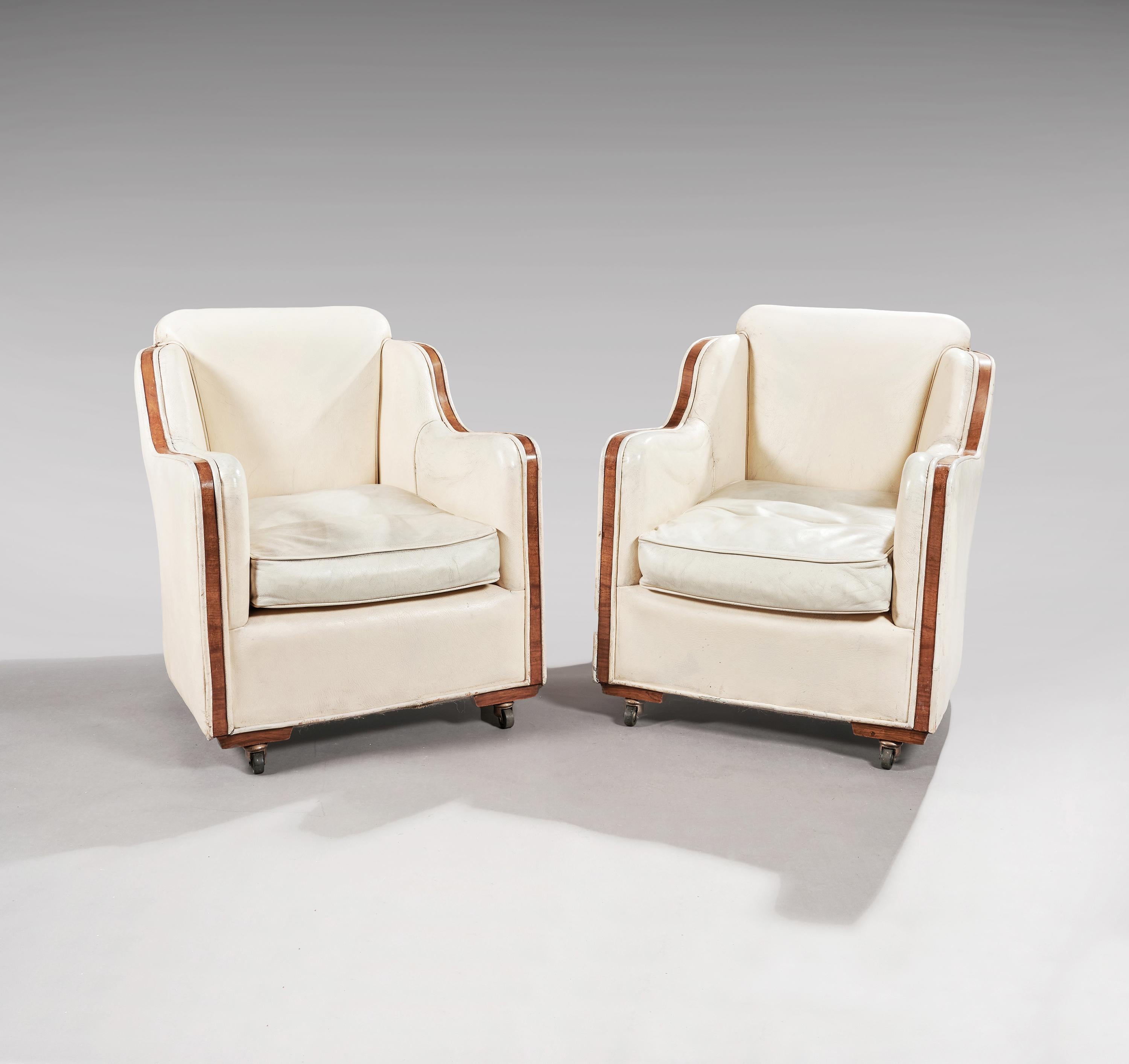 English, circa 1930.

English, circa 1930.

Of excellent quality as you would expect from Epstein with a very good weight to the chairs, the cloud shaped backs having a walnut trim upholstered in the original leather and standing on its 1930s