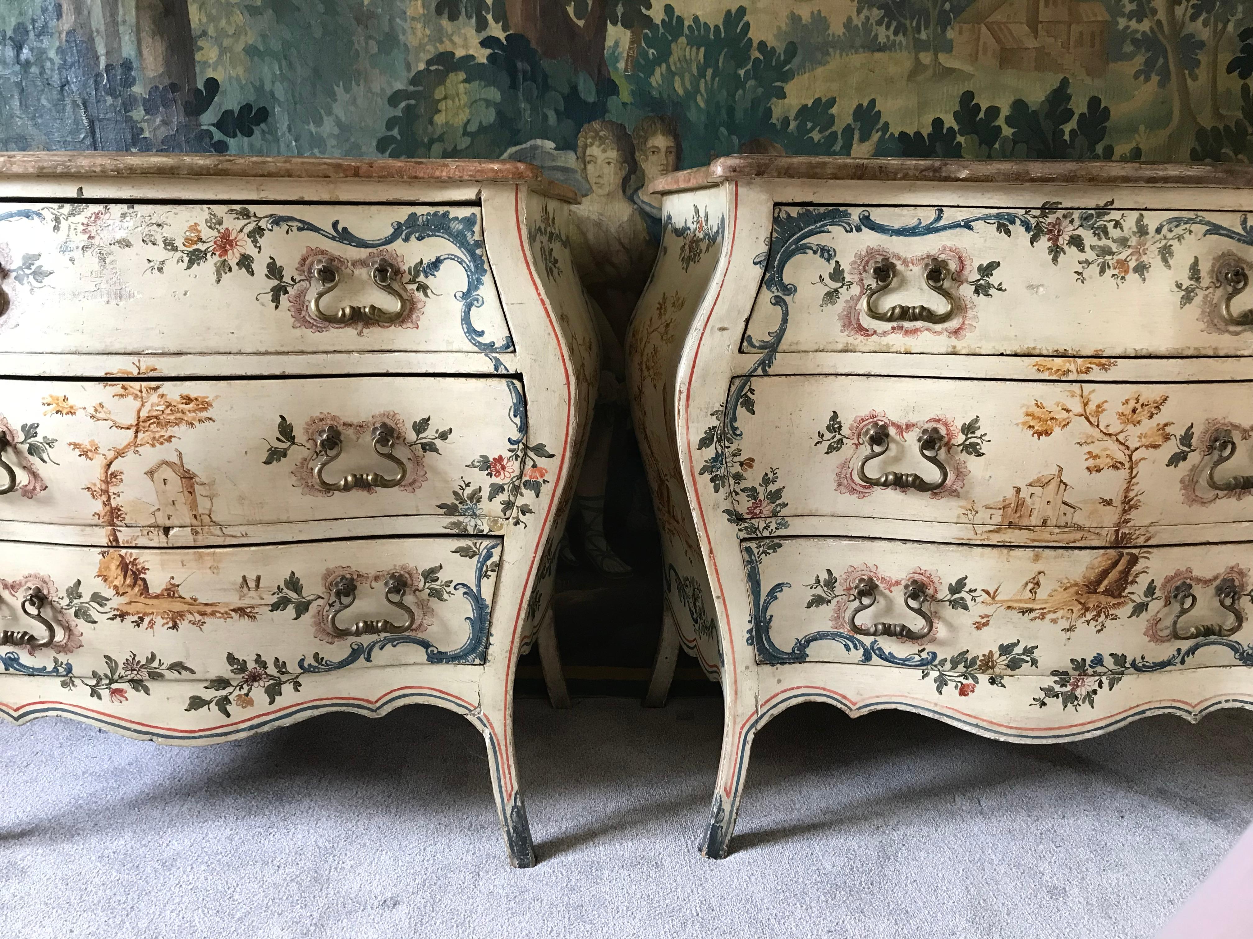 This is a rare pair of genuine early period antique Italian bombe shaped chests of drawers - with gorgeous chinoiserie and flower painted decoration to fronts and both sides with original hardware and all drawers are lined with hand blocked paper (