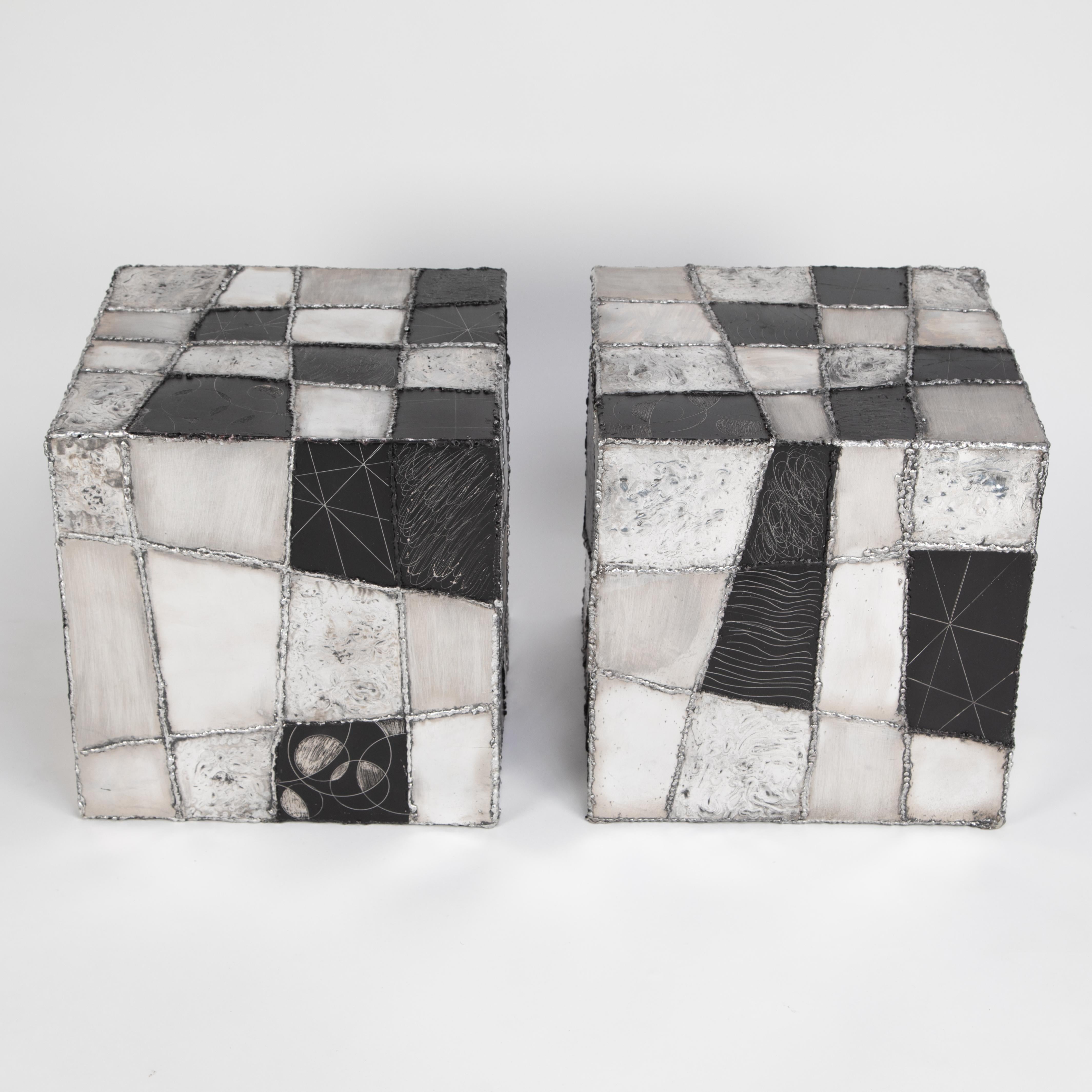 This pair of Paul Evans side tables is a rare and outstanding example of the Pennsylvania artist's 
