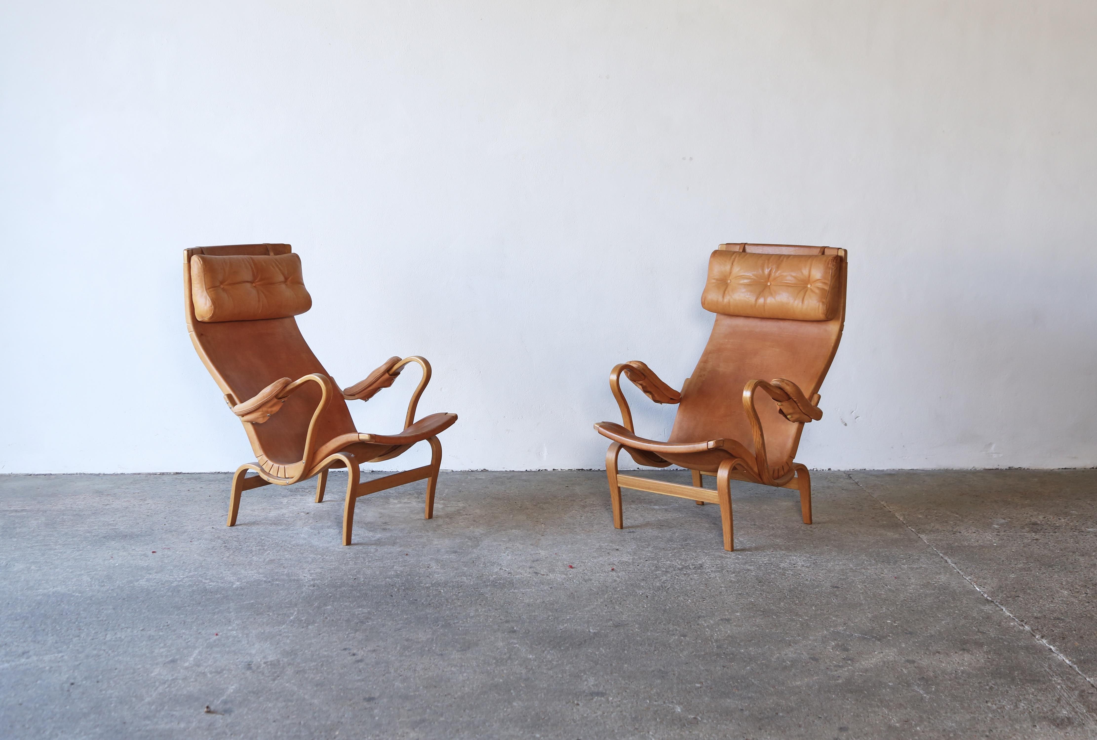Swedish Rare Pair of Pernilla Chairs and Ottoman by Bruno Mathsson, Sweden, 1960s For Sale