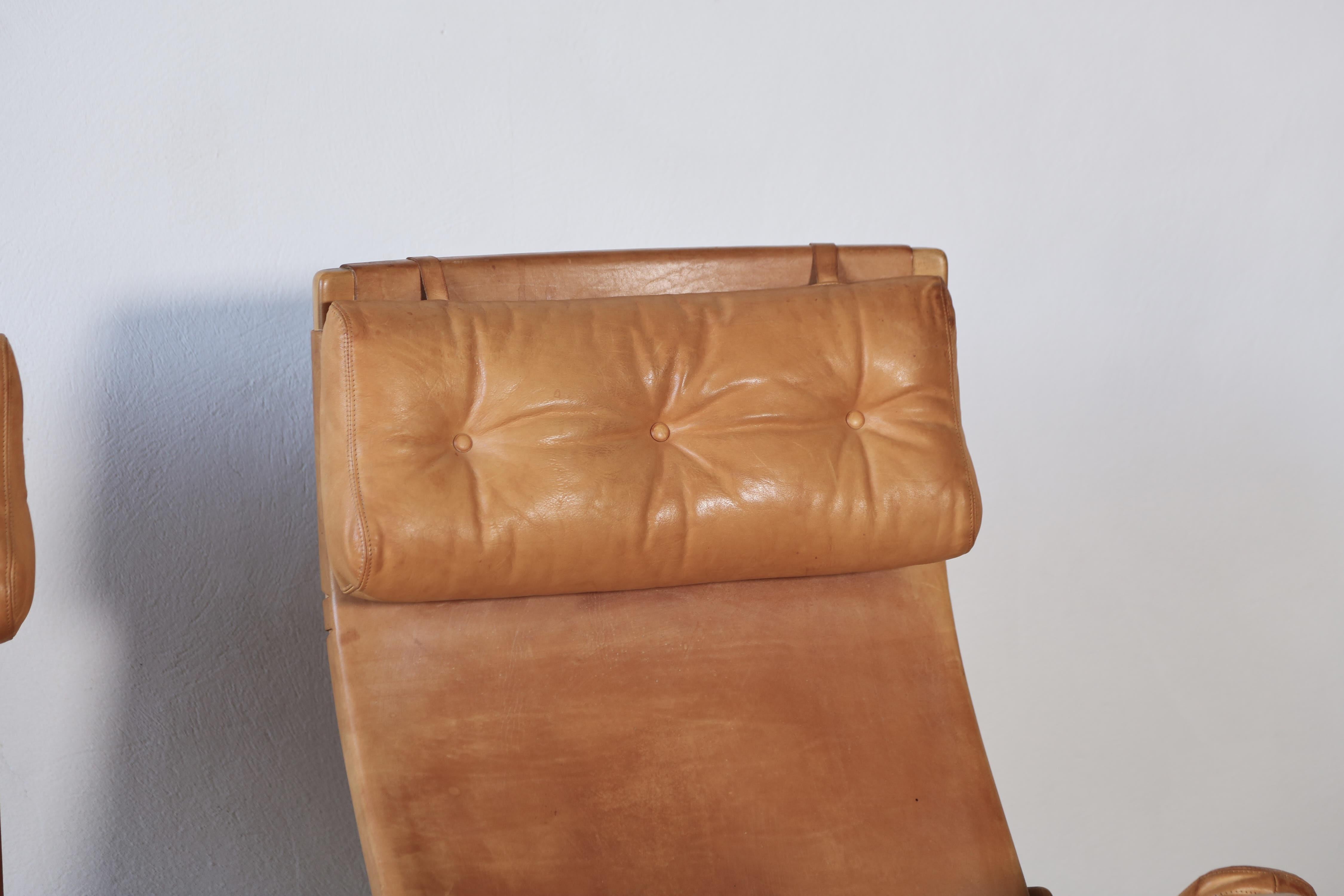 Leather Rare Pair of Pernilla Chairs and Ottoman by Bruno Mathsson, Sweden, 1960s For Sale