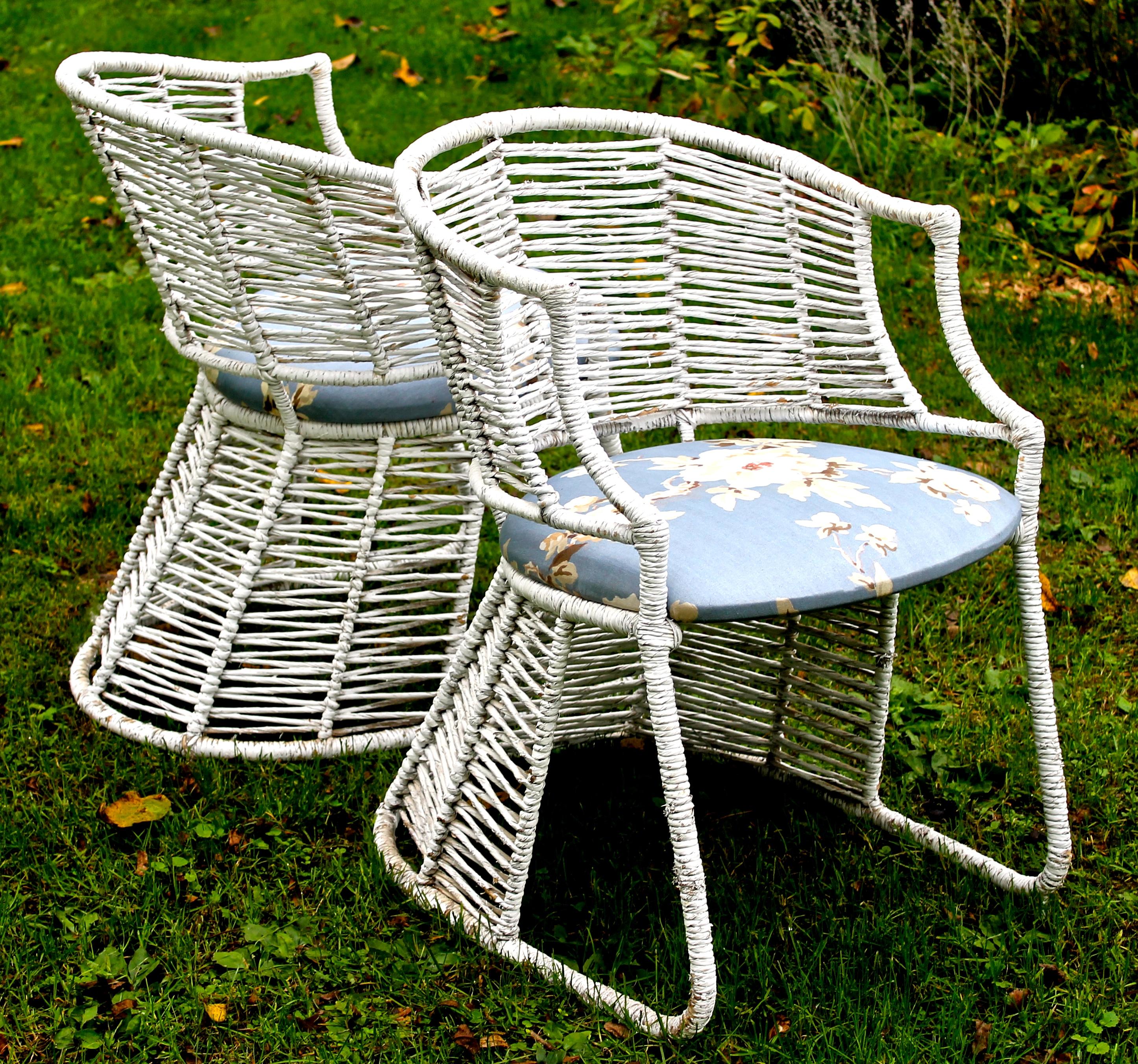 Two chairs in the manner of early Pierre Chareau. White painted 'twine' (twisted paper) over a tubular metal structure.