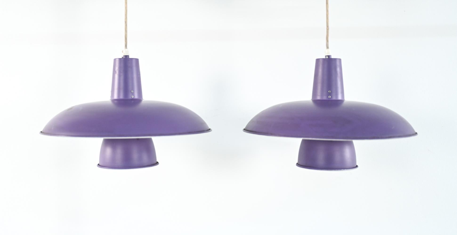Two pairs are available - this is a rare opportunity to own four matching pendants! 
Little information is available on the rare PH Badminton pendant light by Poul Henningsen. The lamp was reportedly designed in the 1930's for use in Danish