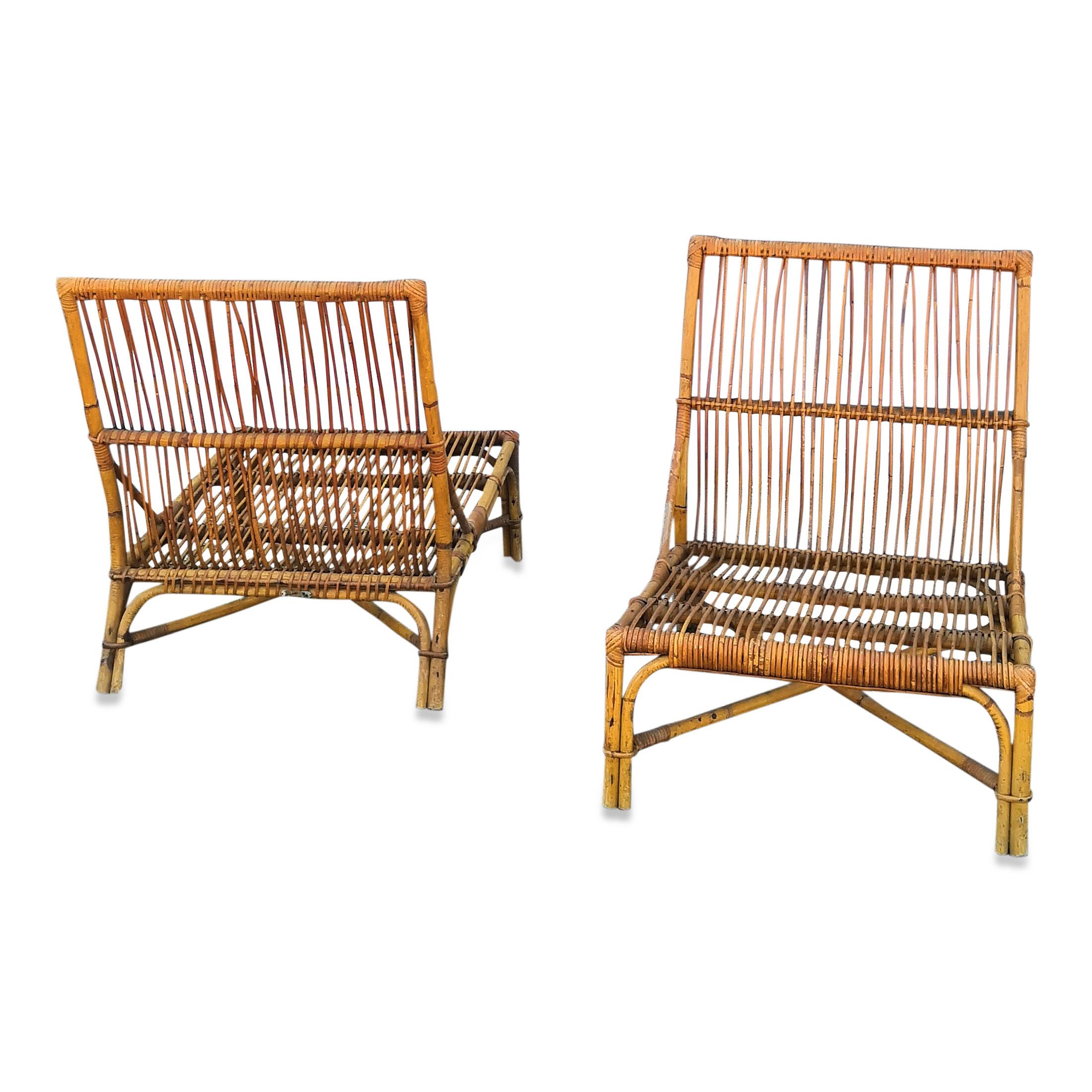 Rare Pair of Rattan Lounge Chairs by Audoux Minnet, France, 1950s In Good Condition In New York, NY
