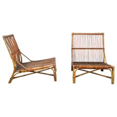 Rare Pair of Rattan Lounge Chairs by Audoux Minnet, France, 1950s