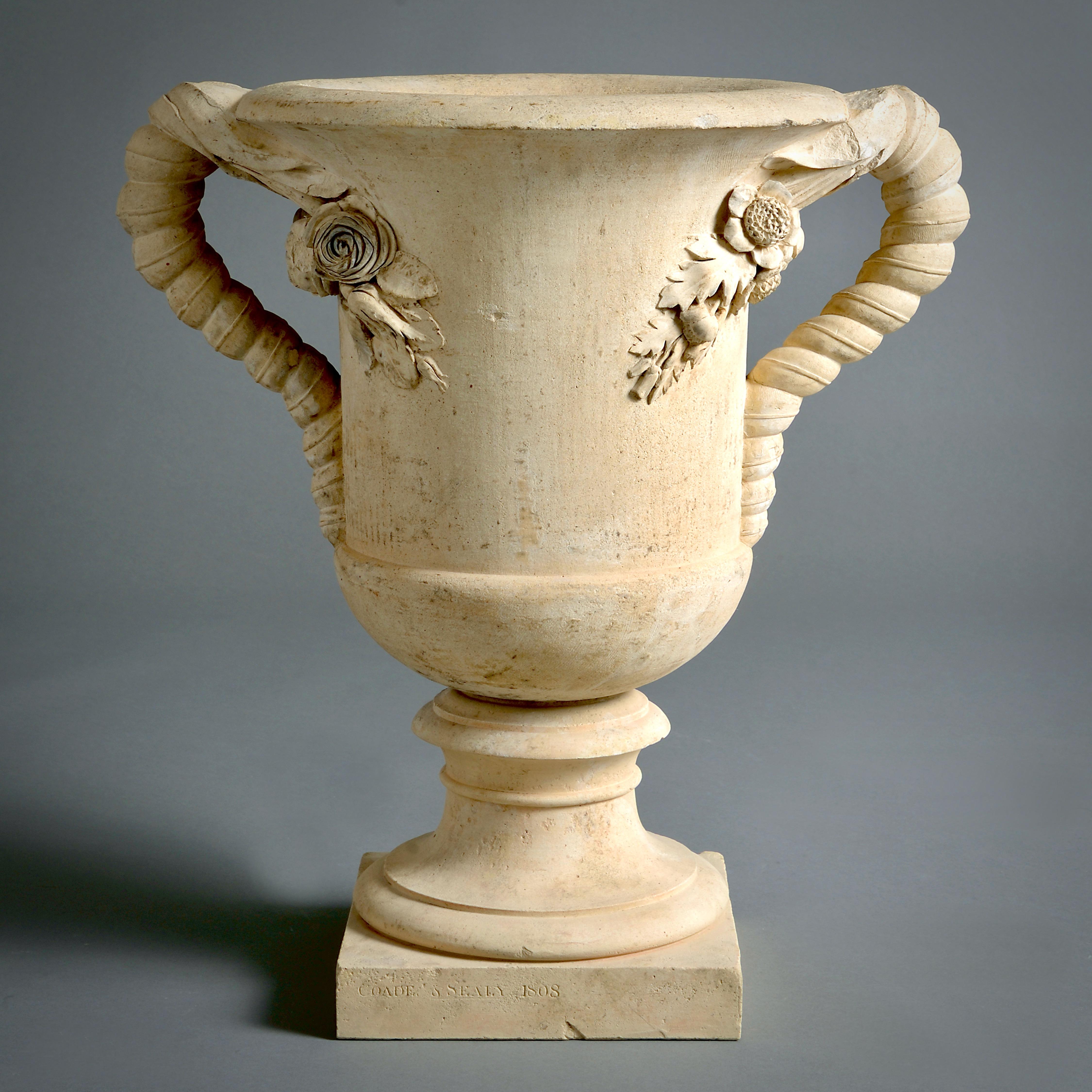 UNA COPPIA RARA E FORSE UNICA DI VASI COADESTONE DELLA REGGENZA, 1808.

Firmato e datato Coade & SEALY 1808. 

Provenienza: I Conti di Devon, Castello di Powderham.