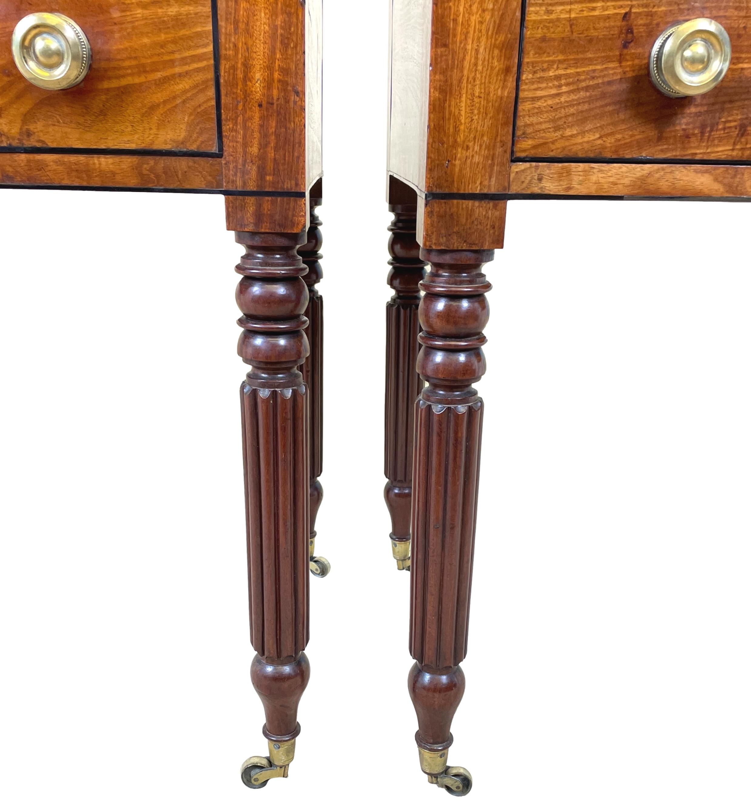 A Stunning Quality And Extremely Rare Pair Of 19th Century Regency Period Mahogany Dressing Tables, Of Elegant Concave Form, With Superbly Figured Gallery Tops Over Five Drawers With Original Turned Brass Knobs, Raised On Elegant Turned And Reeded