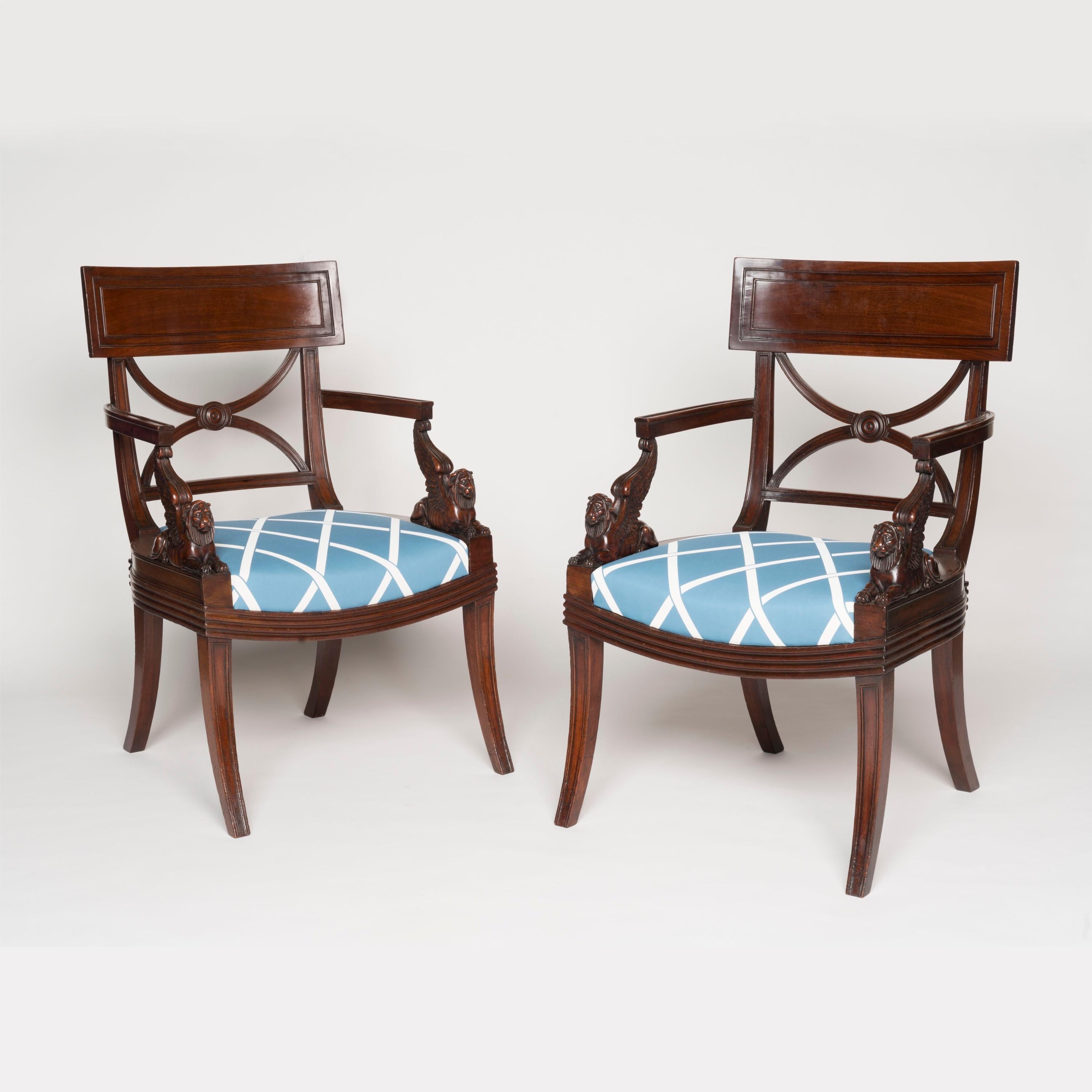 A Pair of Regency Mahogany Armchairs
after Thomas Hope

These exceptional armchairs represent one of the most sophisticated expressions of English Regency design. Constructed in richly patinated mahogany, each chair displays the distinctive klismos