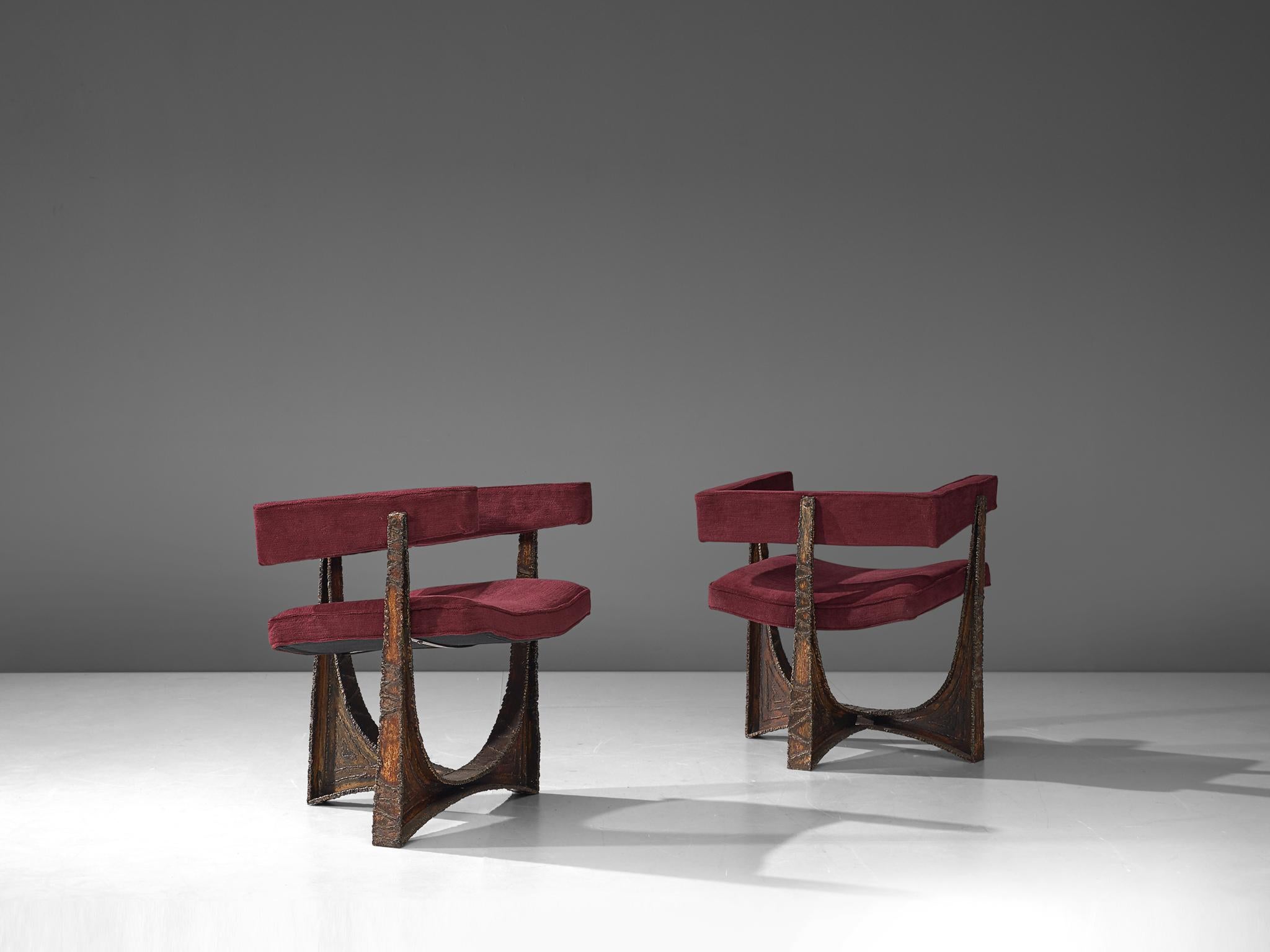 Paul Evans, pair of armchairs, steel and upholstery, United States, 1960s 

A rare pair of highly sculptural armchairs by Paul Evans. The base consists of a torch-cut, welded, polychromed and patinated steel as the foot. The base flows over in a