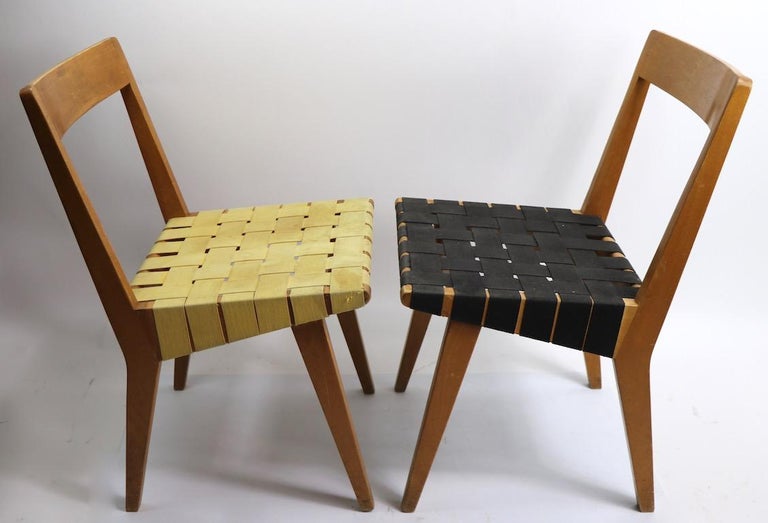 Early and hard to find design by Jens Risom for Knoll, model 666 chairs having birch frames and cloth webbing seats. These chairs are in original and untouched condition, both show light cosmetic wear, normal and consistent with age. Both chairs