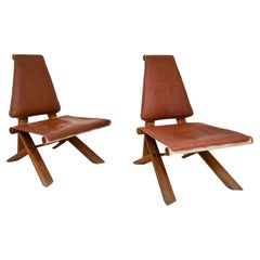Rare pair of S46 easy chairs by Pierre Chapo