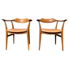 Raro par de sillones Sigurd Ressell para Niels Vodder, roble y cuero