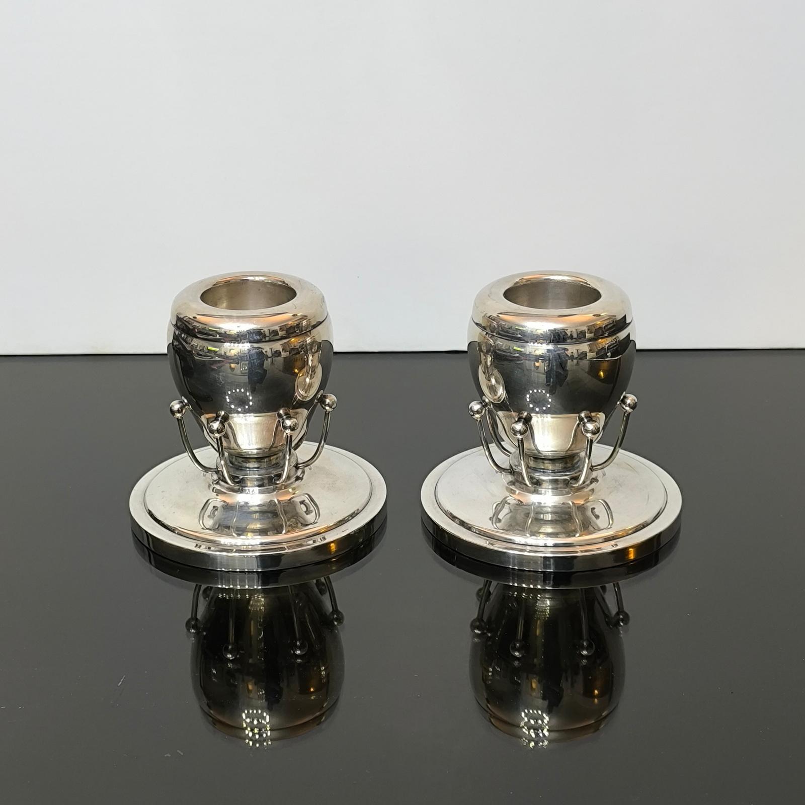 Mid-Century Modern Rare Pair of Silverplate Candle Holders in the Style of Georg Jensen For Sale