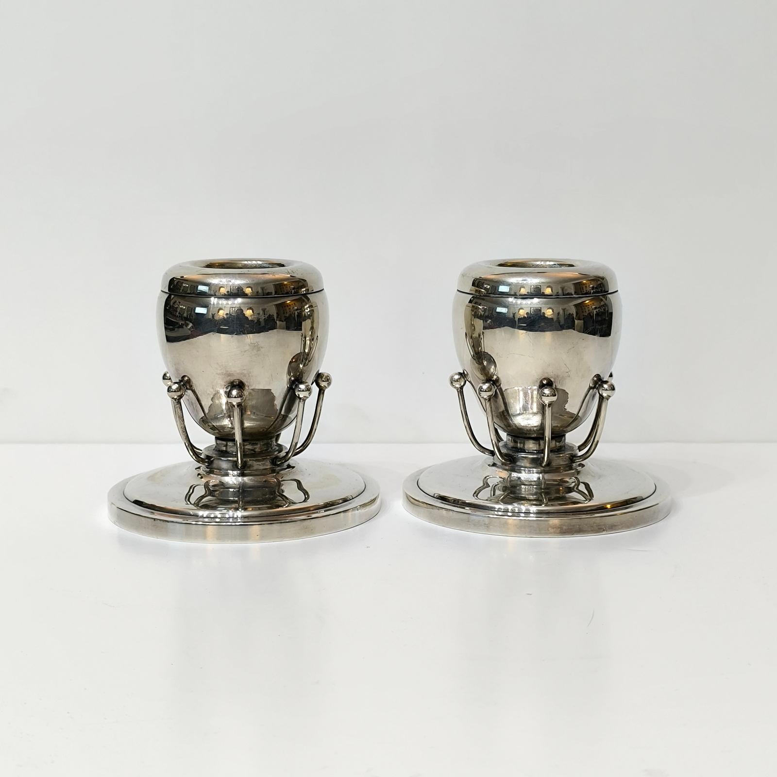 European Rare Pair of Silverplate Candle Holders in the Style of Georg Jensen For Sale