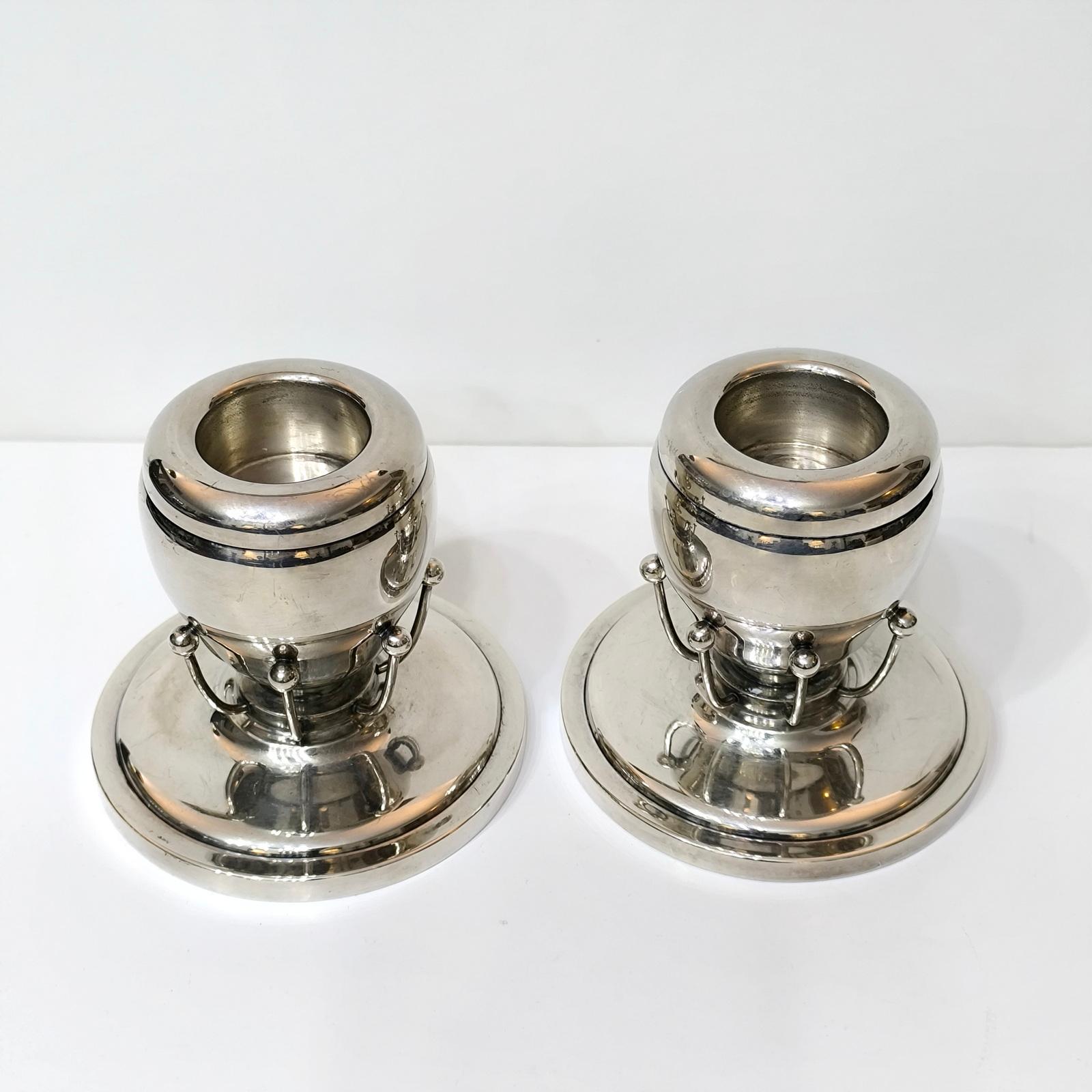 Cast Rare Pair of Silverplate Candle Holders in the Style of Georg Jensen For Sale