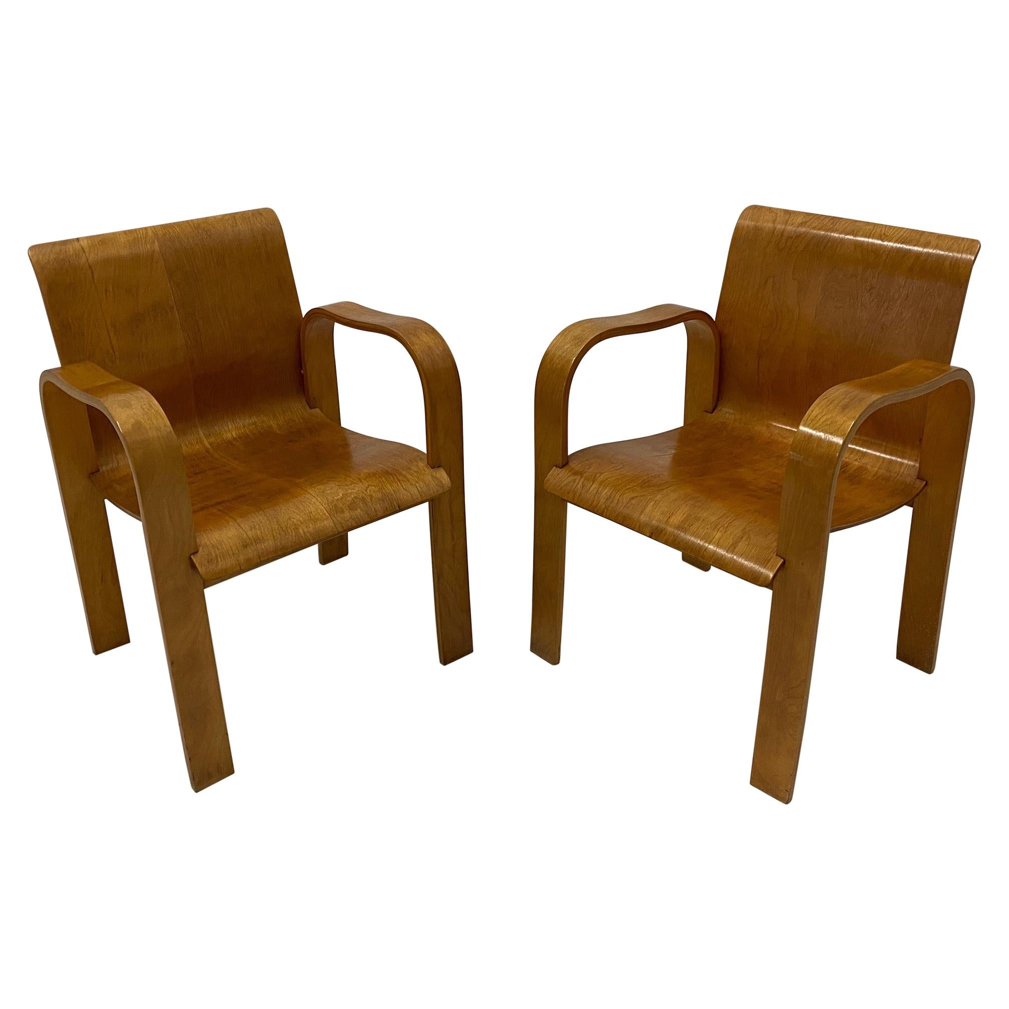 Rare paire de fauteuils en contreplaqué moulé de style moderne du milieu du siècle dernier