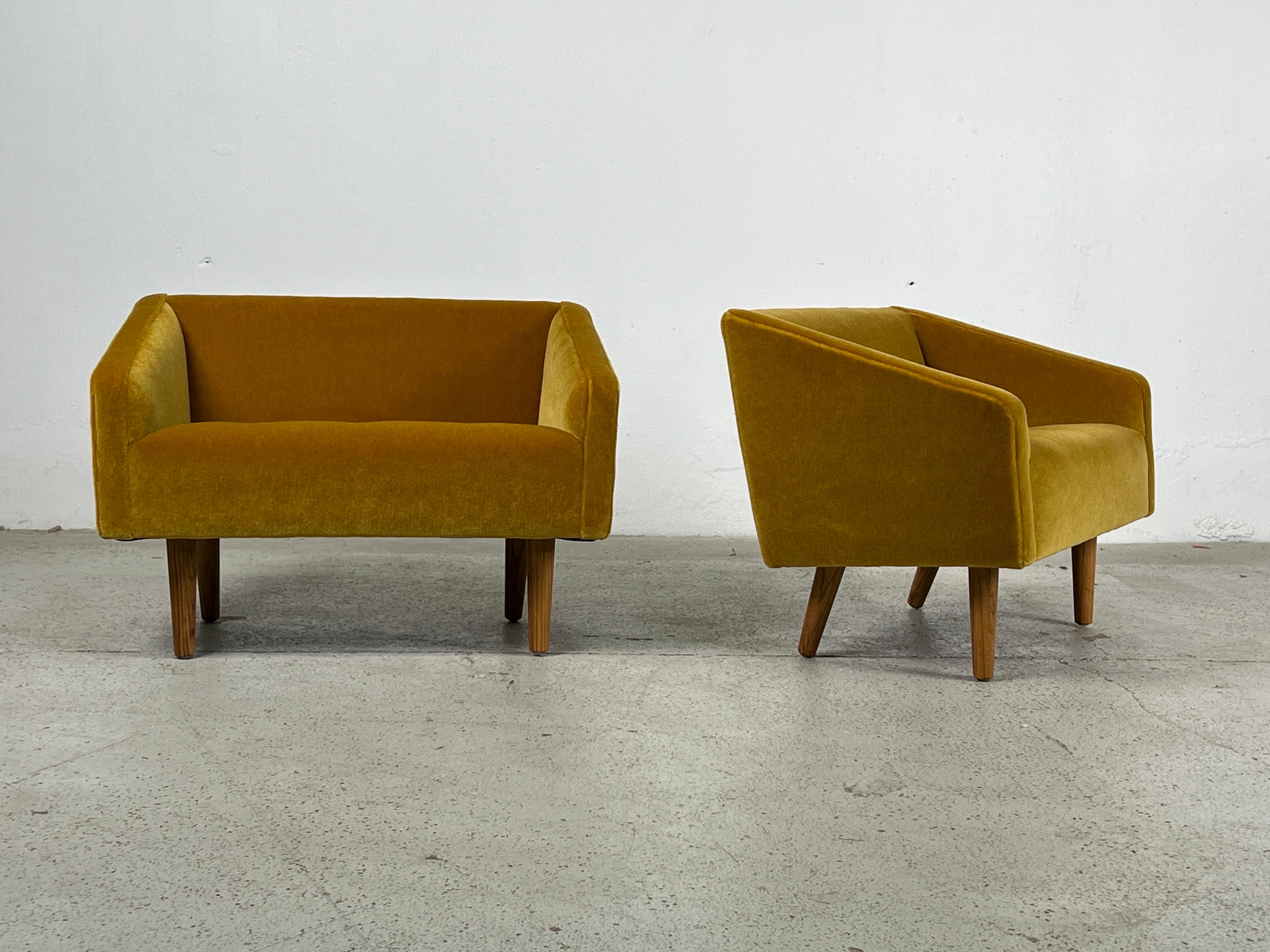 A rare pair of petite slipper benches with Ash legs and new mohair upholstery. Designed by Edward Wormley for Dunbar. 