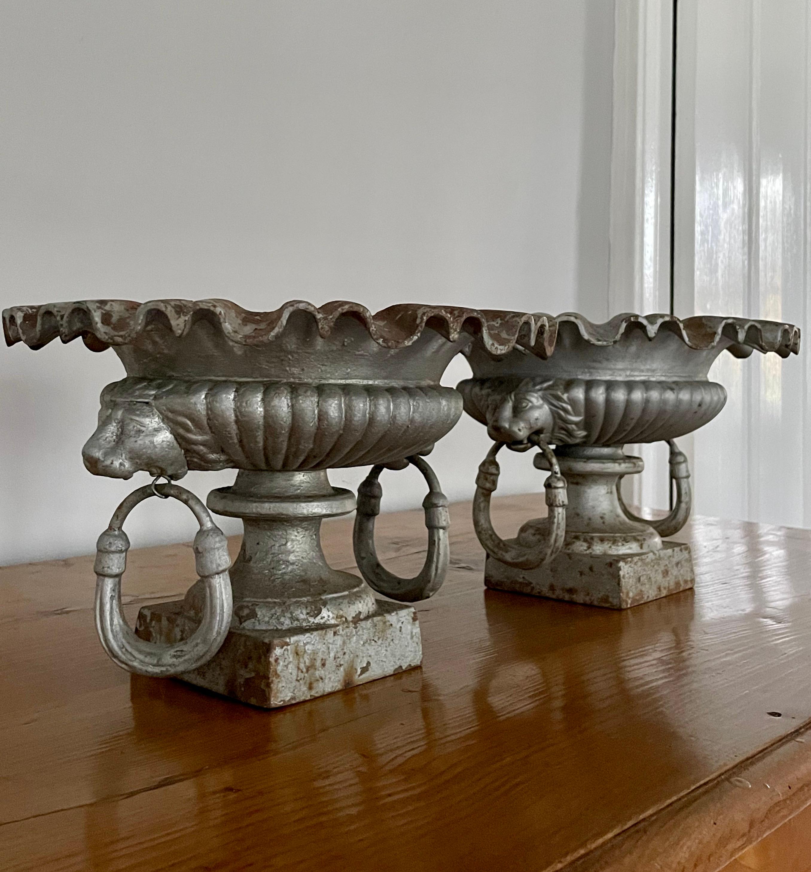 Rare Pair of Small French 19th C Cast Iron Urns with Lion Heads and Ruffled Rims In Good Condition For Sale In Woodbury, CT