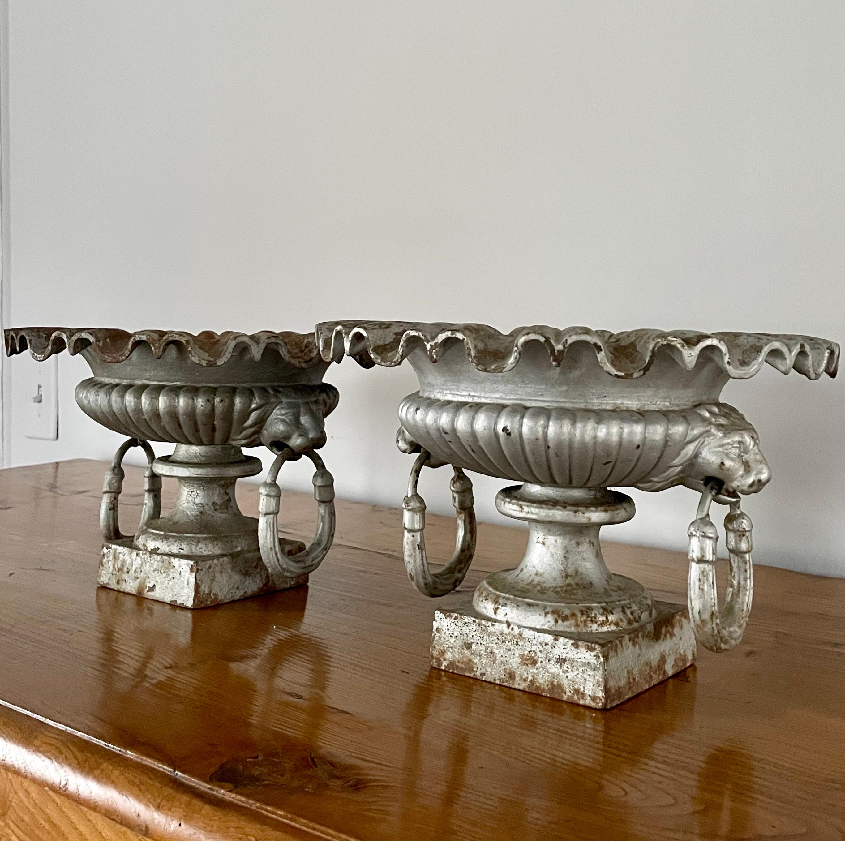 19th Century Rare Pair of Small French 19th C Cast Iron Urns with Lion Heads and Ruffled Rims For Sale