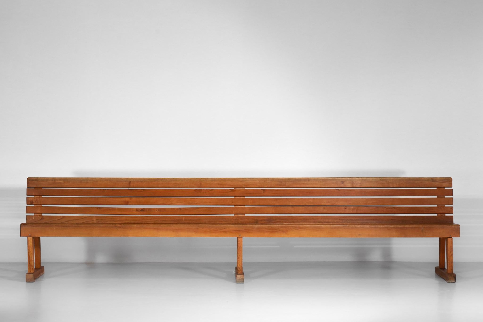 Very long benches (340 cm) from the 1950s in solid oak. French handcrafted work.