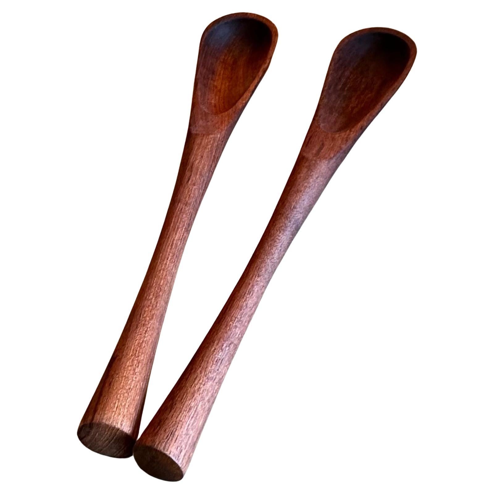 Rare pair of solid teak salad servers by Jens Quistgaard for Dansk, circa 1950s.  The set is in very good vintage condition and measures 2.25