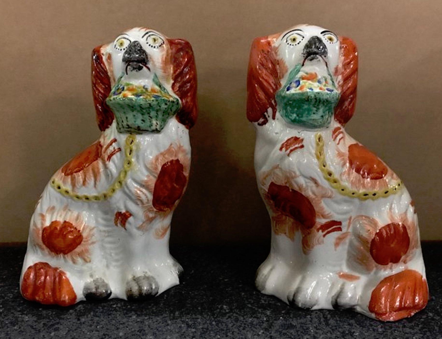 Rare Pair of Staffordshire Seated Red Spaniels with Baskets of Flowers For Sale 3