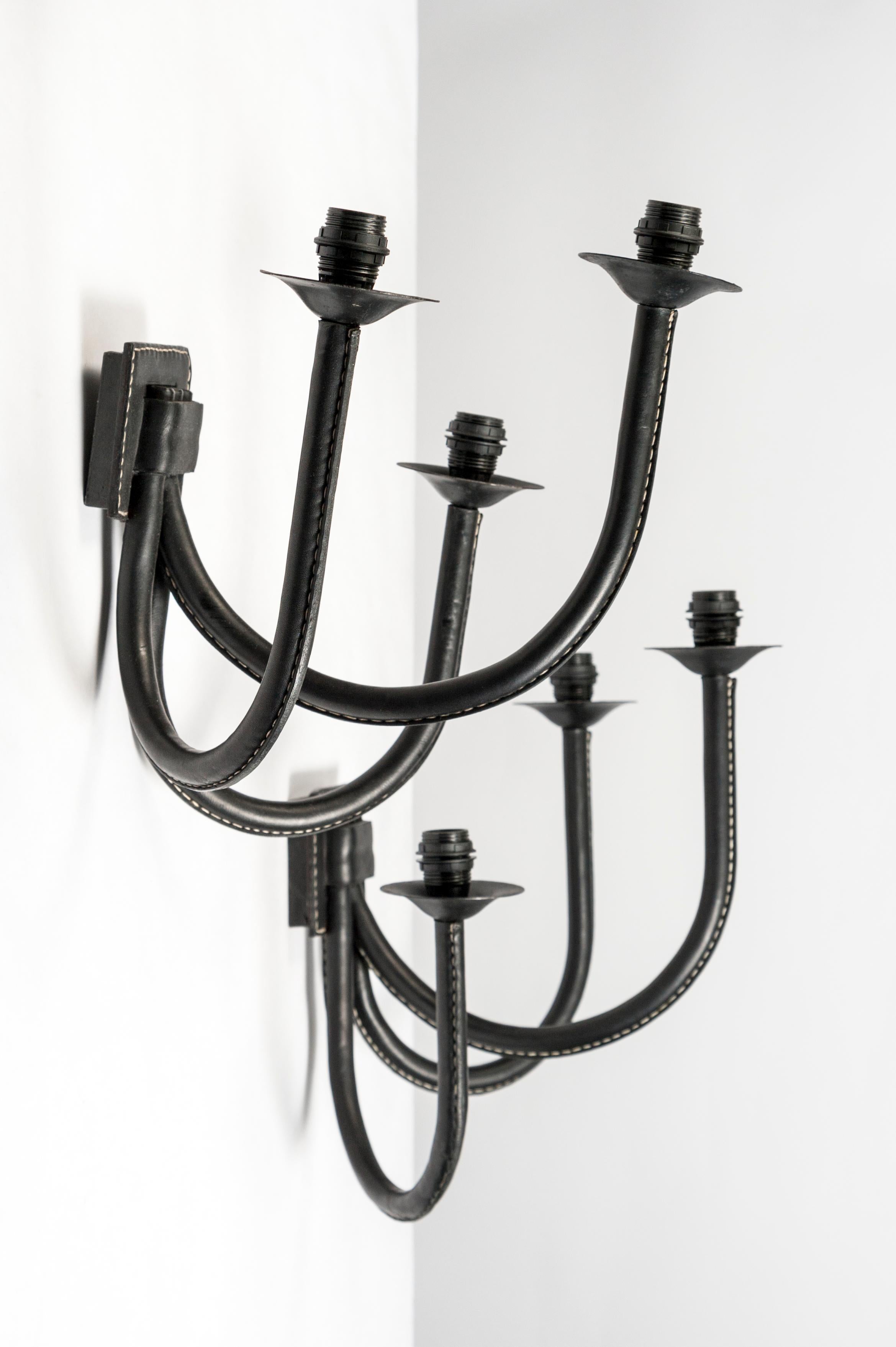 Mid-20th Century Rare Pair of Stitched Leather Sconces Designed by Jacques Adnet