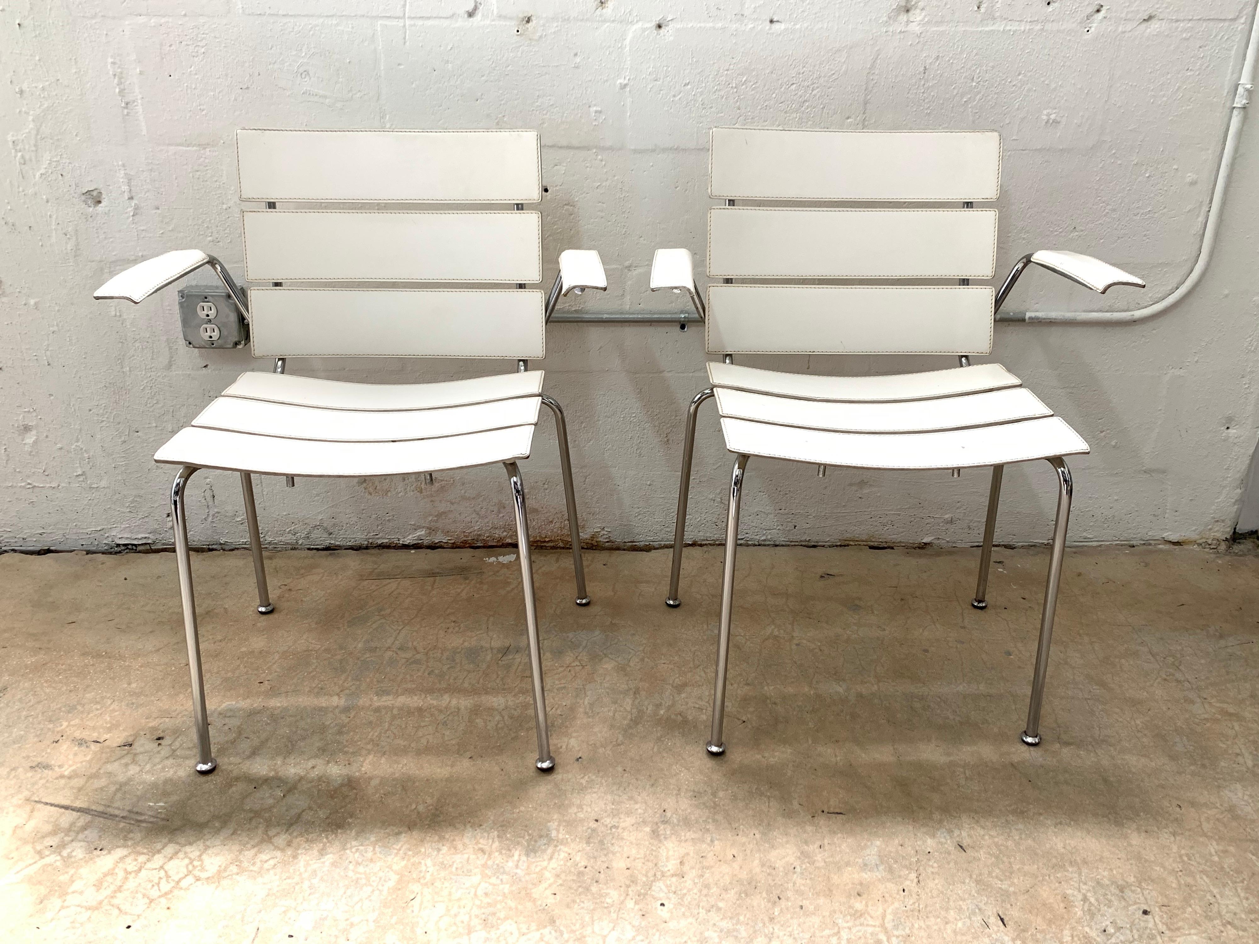 Pair of rare chairs rendered in white stitched leather seat, back, and arms with chrome-plated steel frames designed by Giancarlo Vegni for Fasem, made in Italy, 1999.