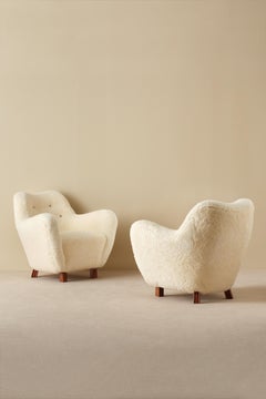 Rare Pair of Swedish Sheepskin Easy Chairs, 1950s