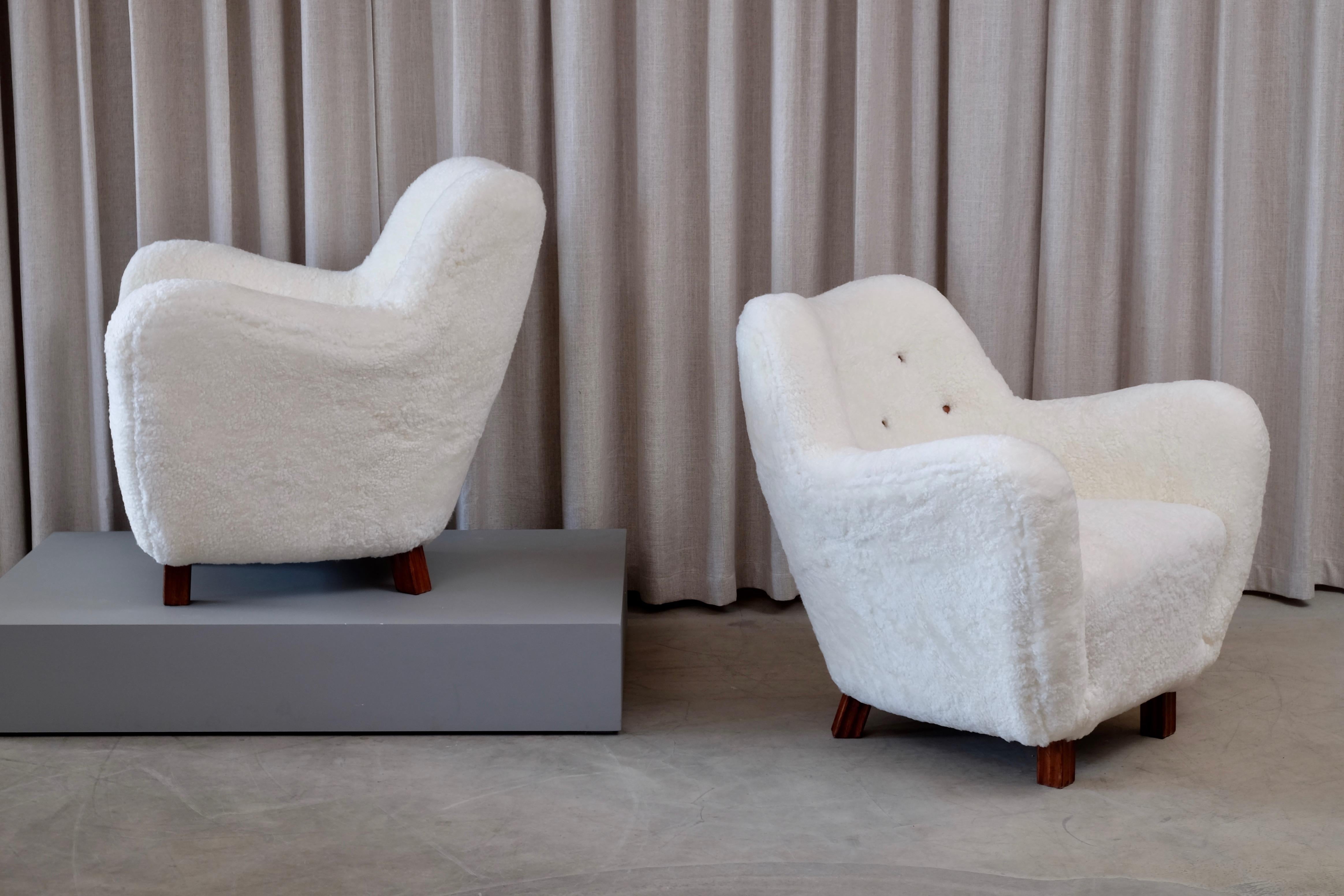 Scandinavian Modern Rare Pair of Swedish Sheepskin Easy Chairs, 1950s For Sale