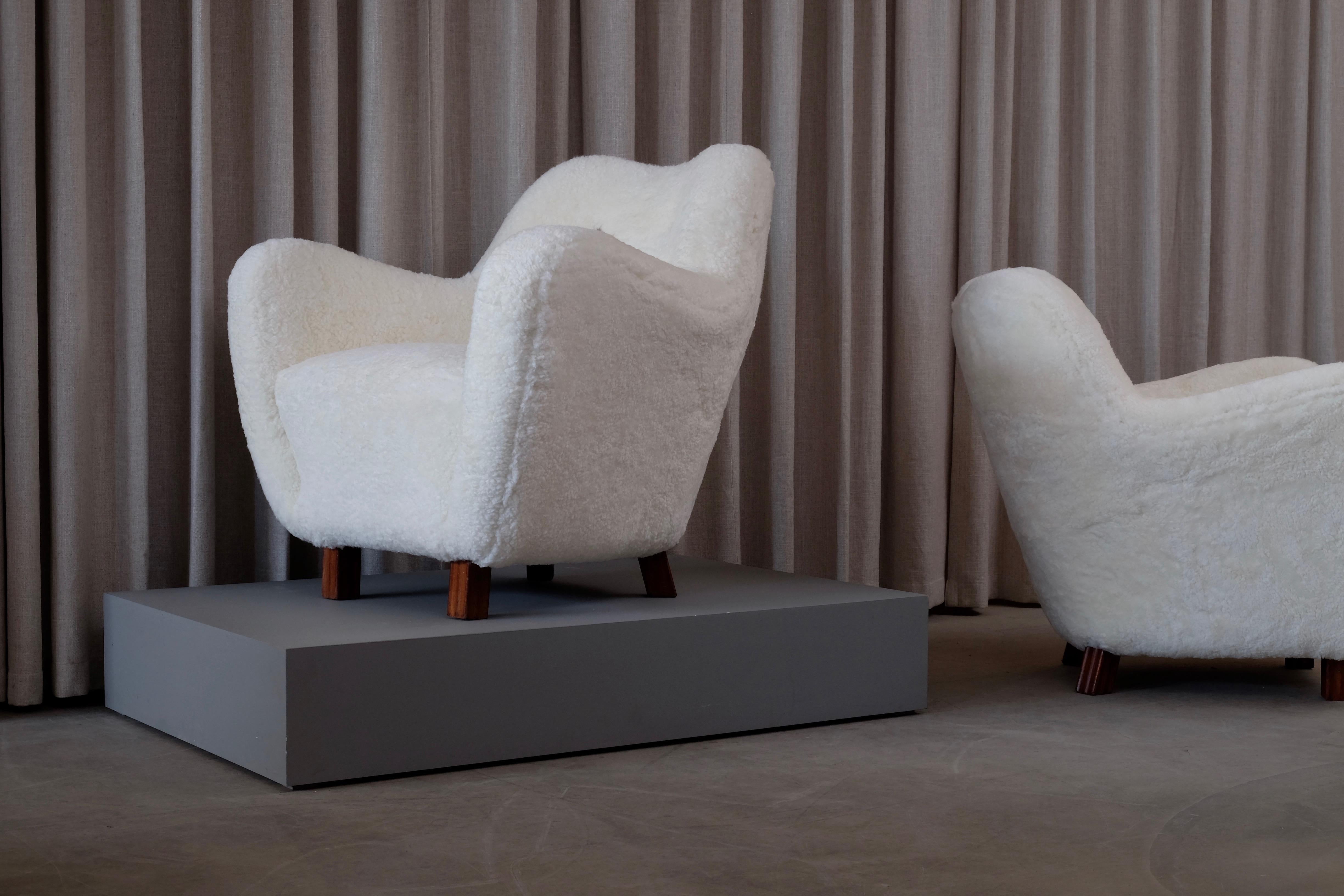 Mid-20th Century Rare Pair of Swedish Sheepskin Easy Chairs, 1950s For Sale