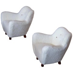 Seltenes Paar schwedischer Easy Chairs aus Schafsleder, 1950er Jahre