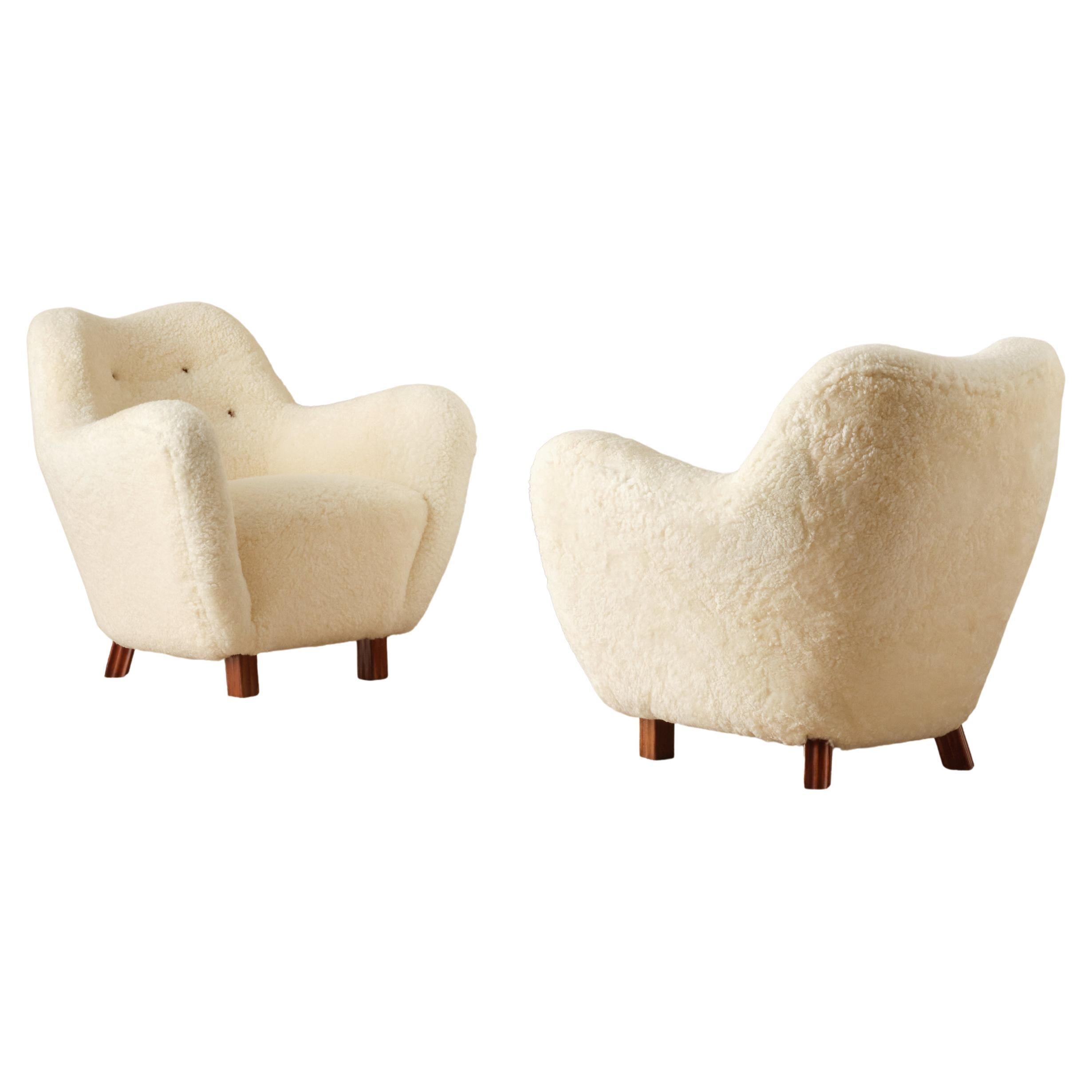Rare Pair of Swedish Sheepskin Easy Chairs, 1950s in vendita