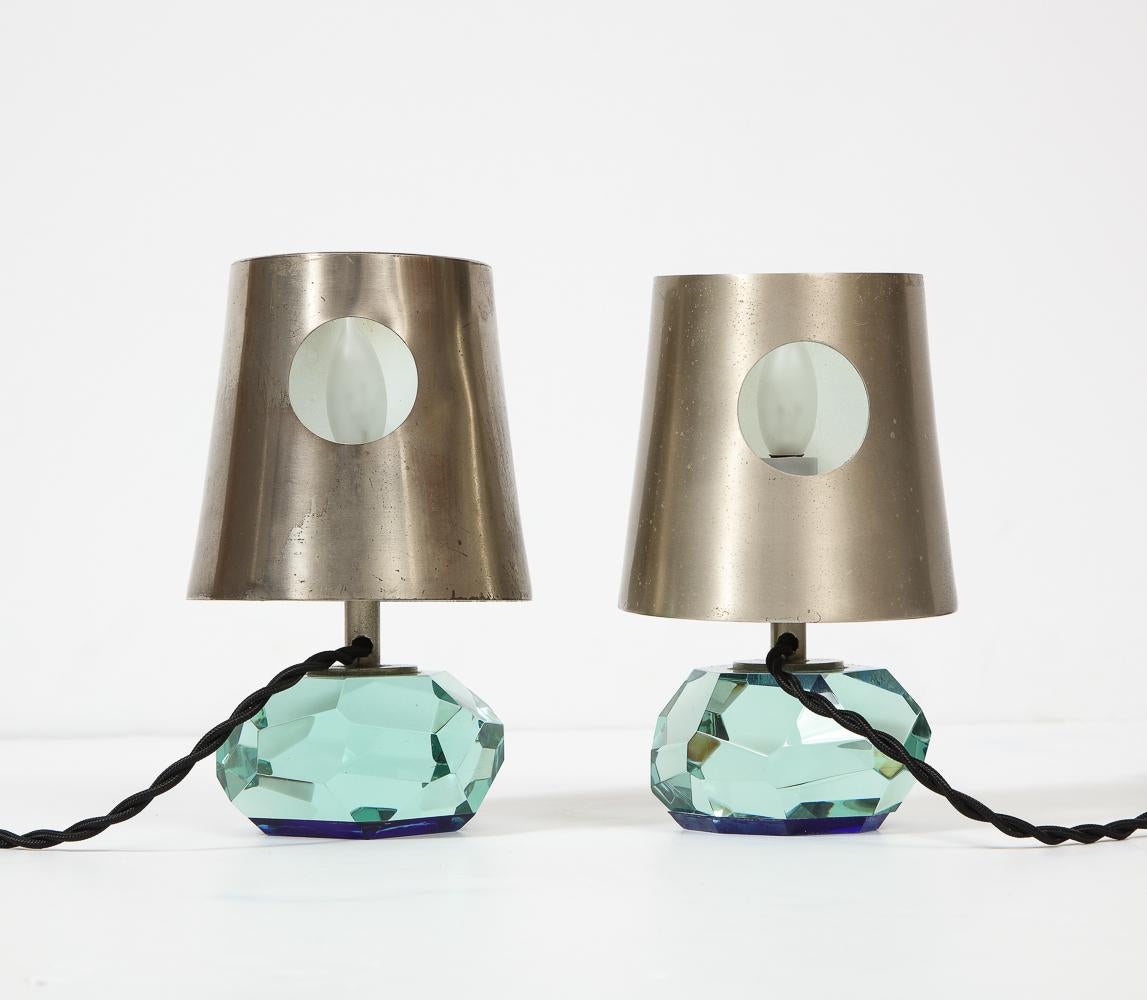 Crystal-cut glass, colored glass, nickel-plated brass. Exceptional & rare pair of petite lamps with one candelabra socket per lamp. Very good condition, all elements have been recently cleaned and sockets and wiring have been changed. Metal shades