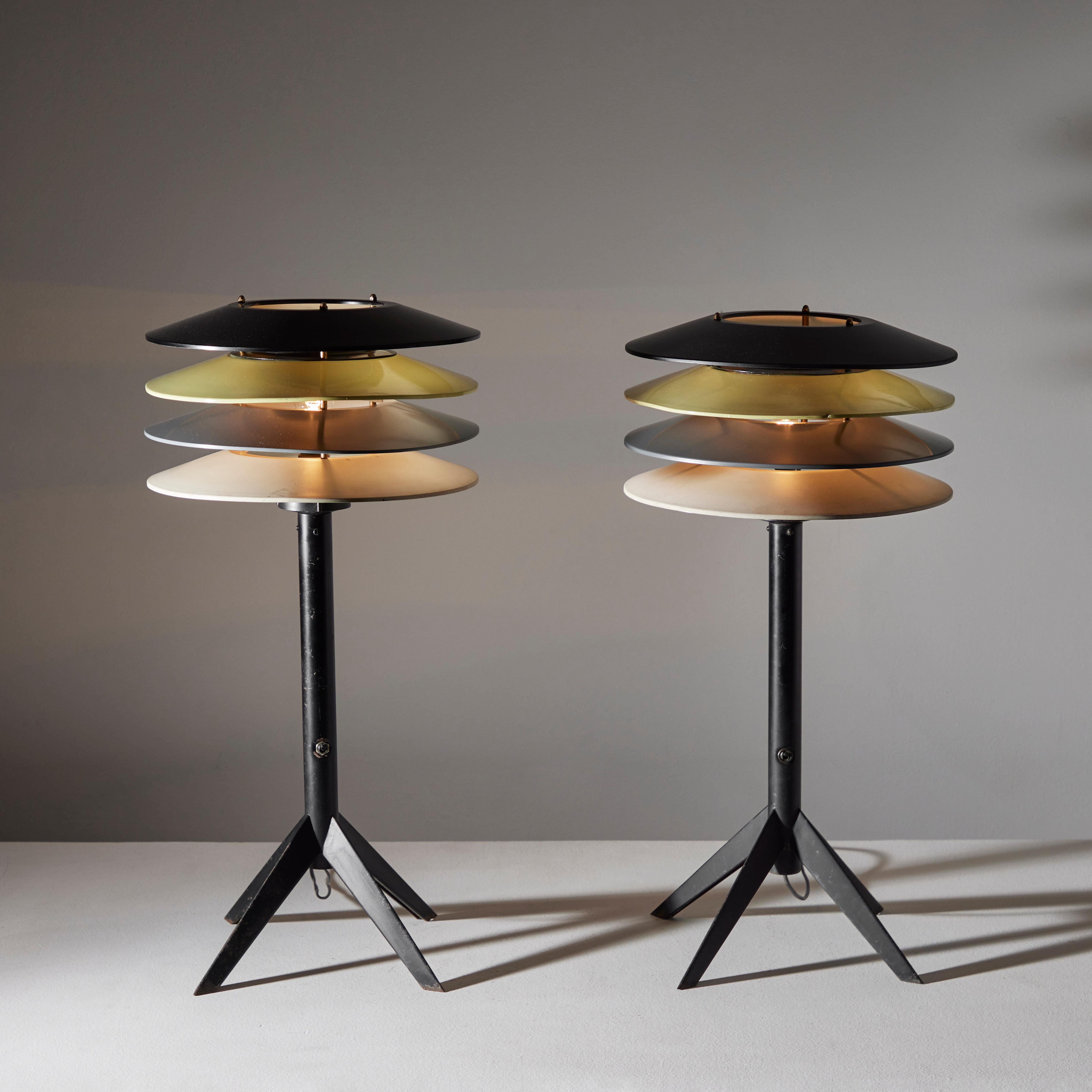 Rare Pair of table lamps by Stilnovo. Designed and manufactured in Milan Italy, circa 1960's. Enameled metal, brass. Original EU cord. We recommend Lamping: 120v 1 Qty E27 Socket 60w Clear Bulb. Lightbulbs not included. Stilnovo Sticker on shade.