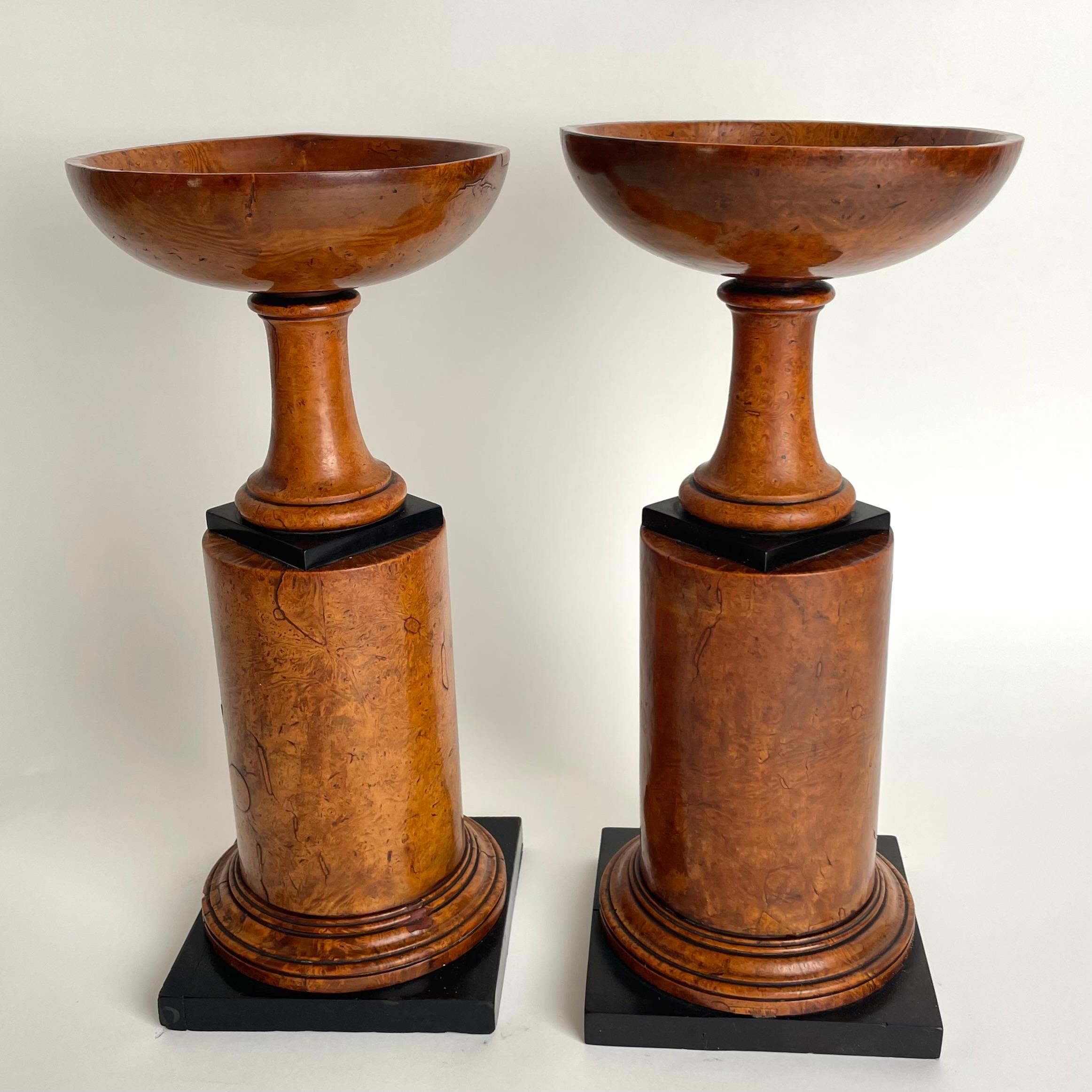 A large and rare pair of Tazzas made in Maple Root with beautful blackened details. Made in Europe in Empire, during the 1820s. Extremely charming and with a wonderful patina.

Wear consistent with age and use 